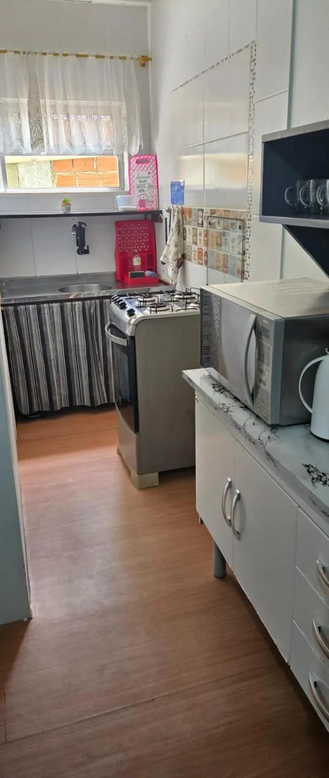 Kitchen or kitchenette in Recanto Dos Vargas - Seu refúgio em Floripa com atendimento dos anfitriões