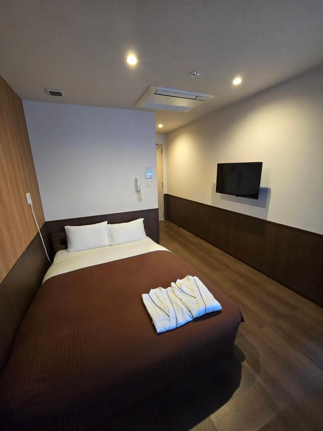 Bed in Hotel Ekichika Nagahoribashi