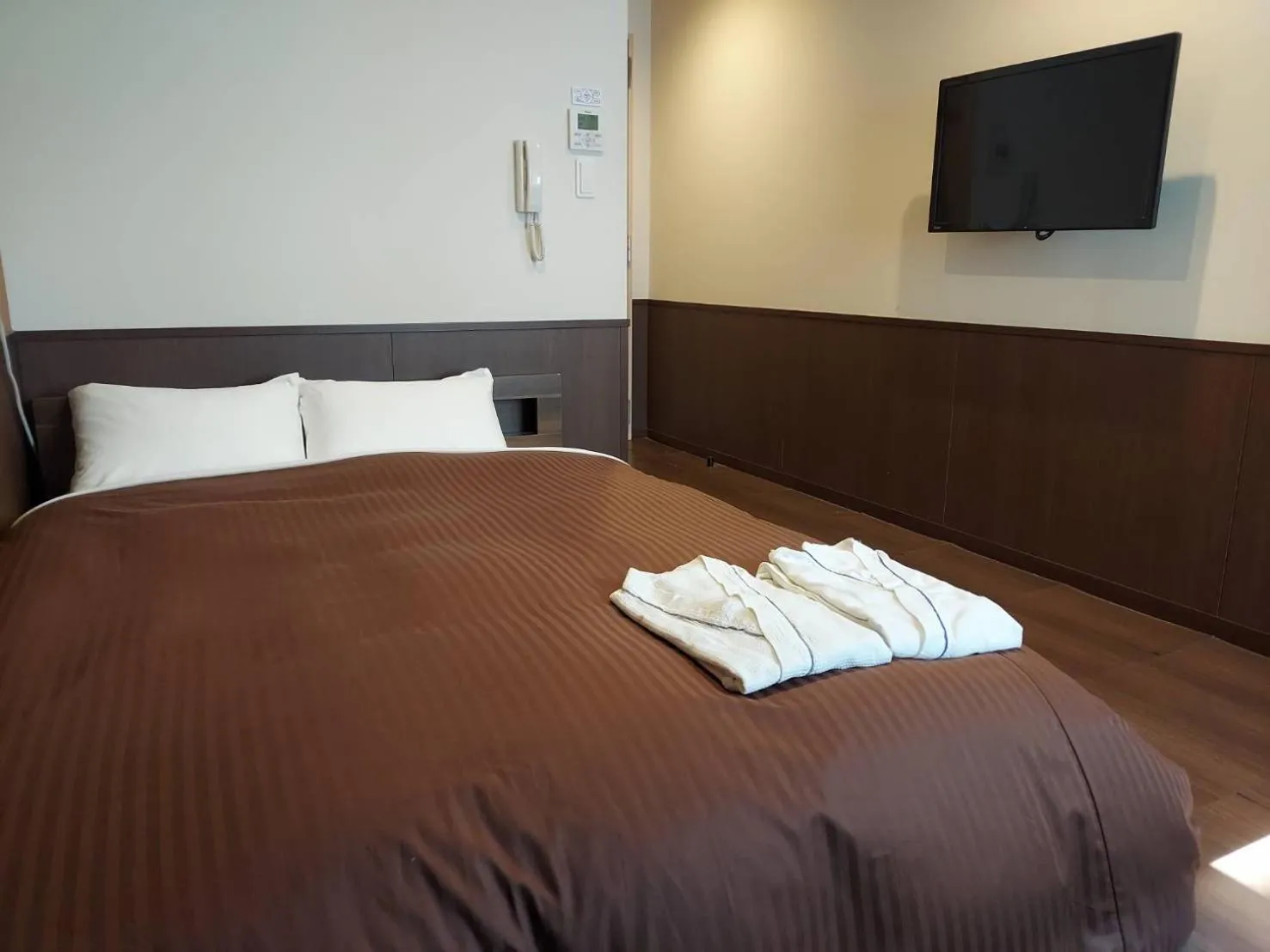 Bed in Hotel Ekichika Nagahoribashi