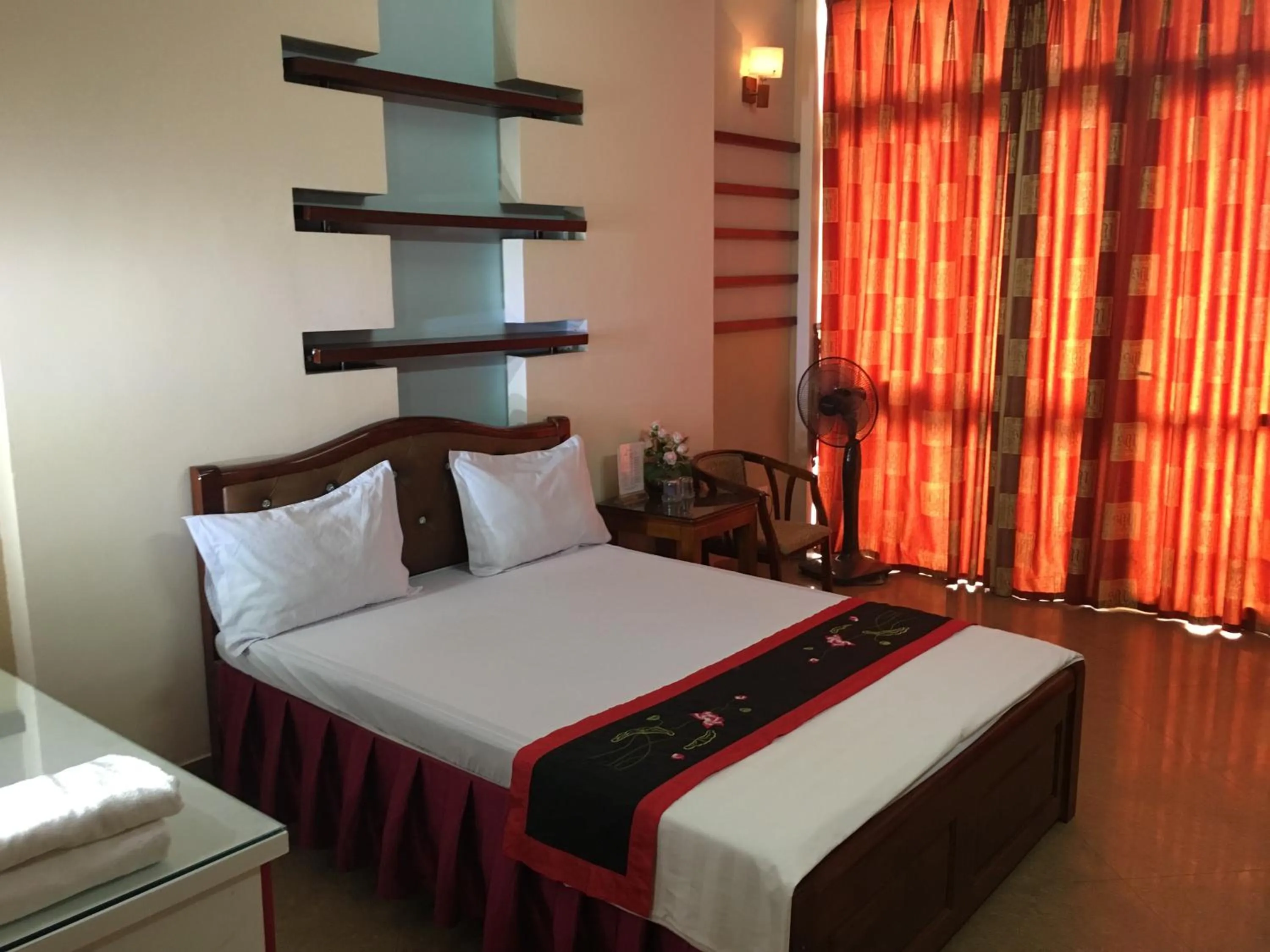 Bed in Sunrise Hotel