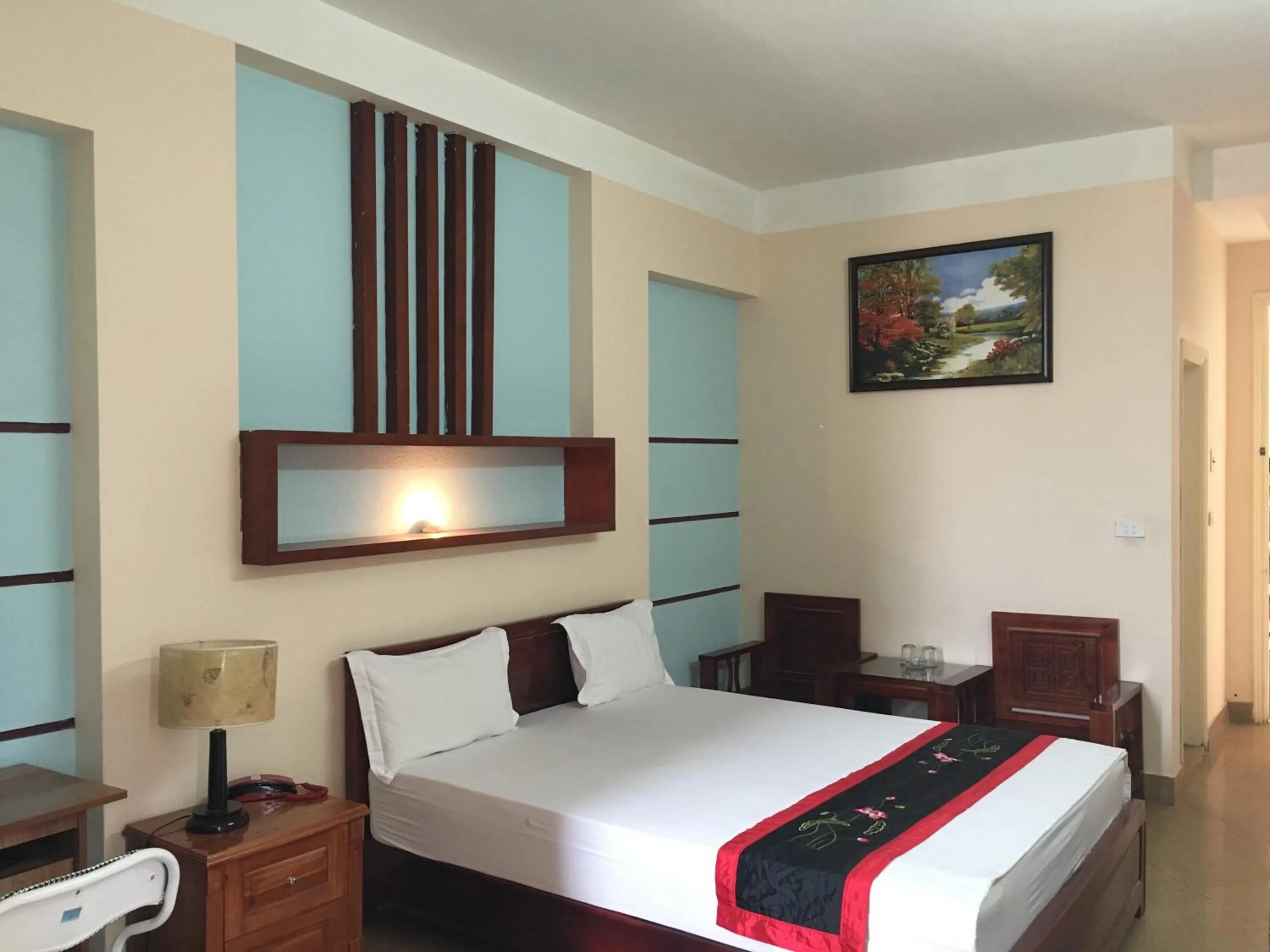 Bed in Sunrise Hotel