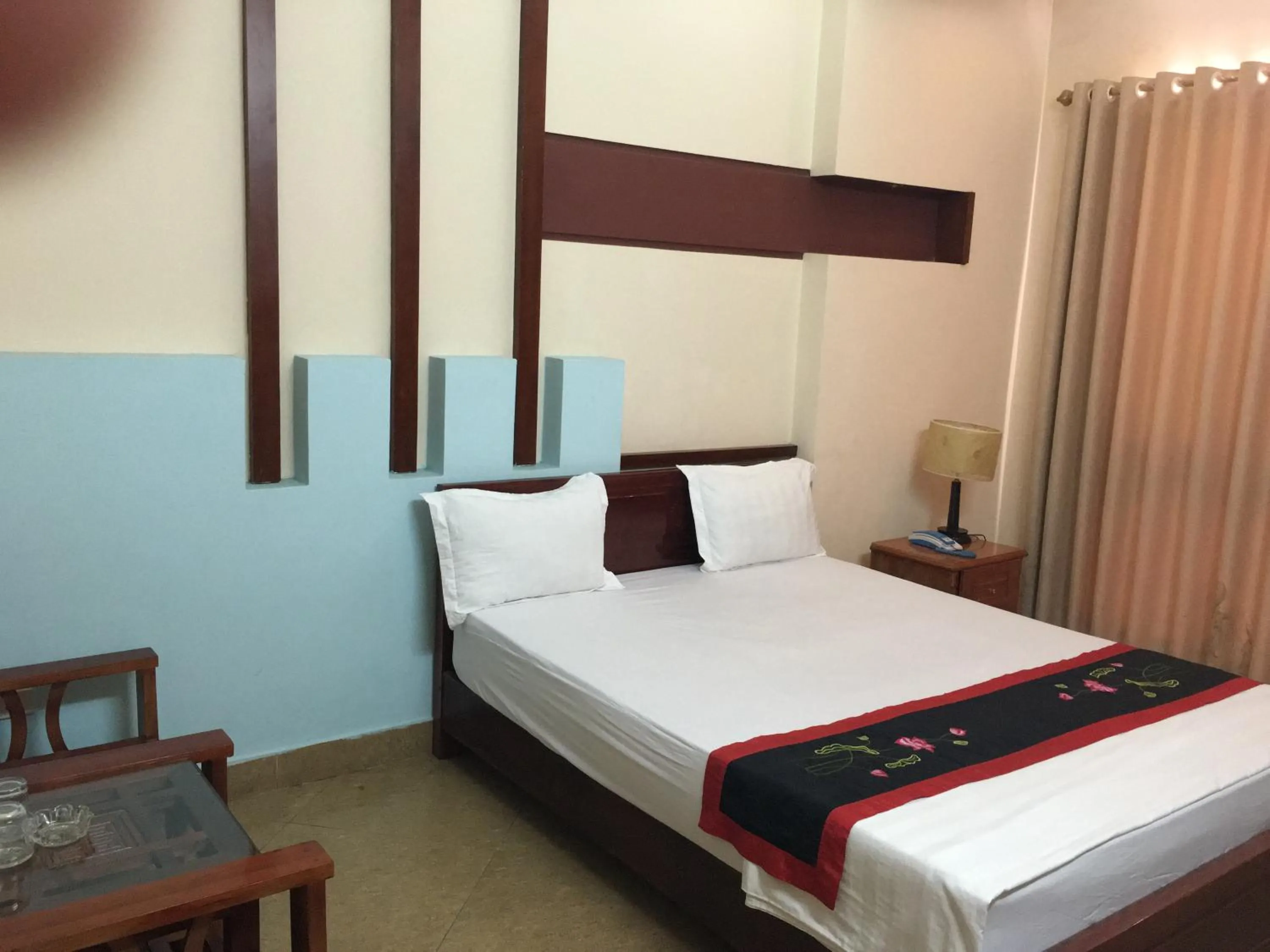 Bed in Sunrise Hotel