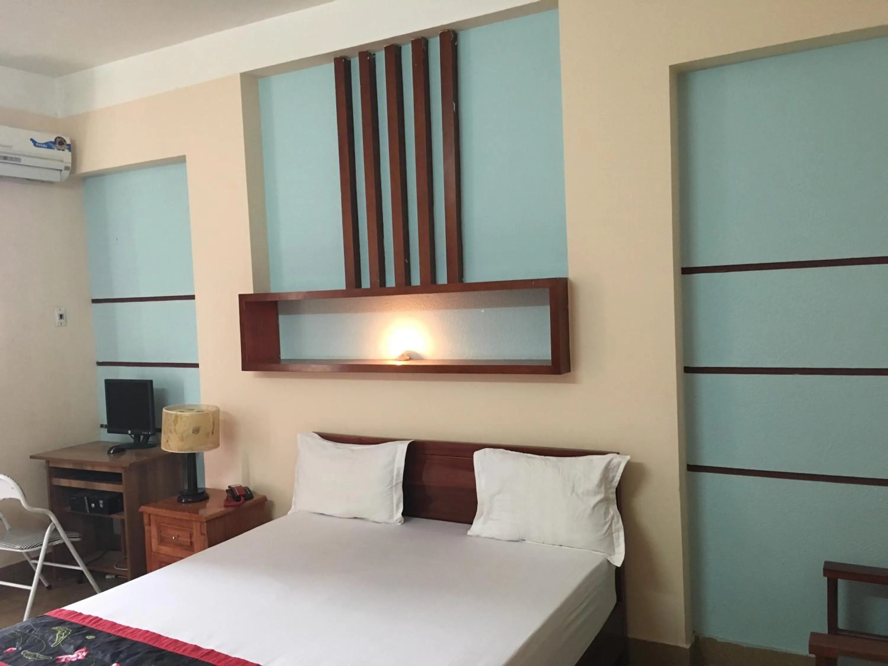 Bed in Sunrise Hotel