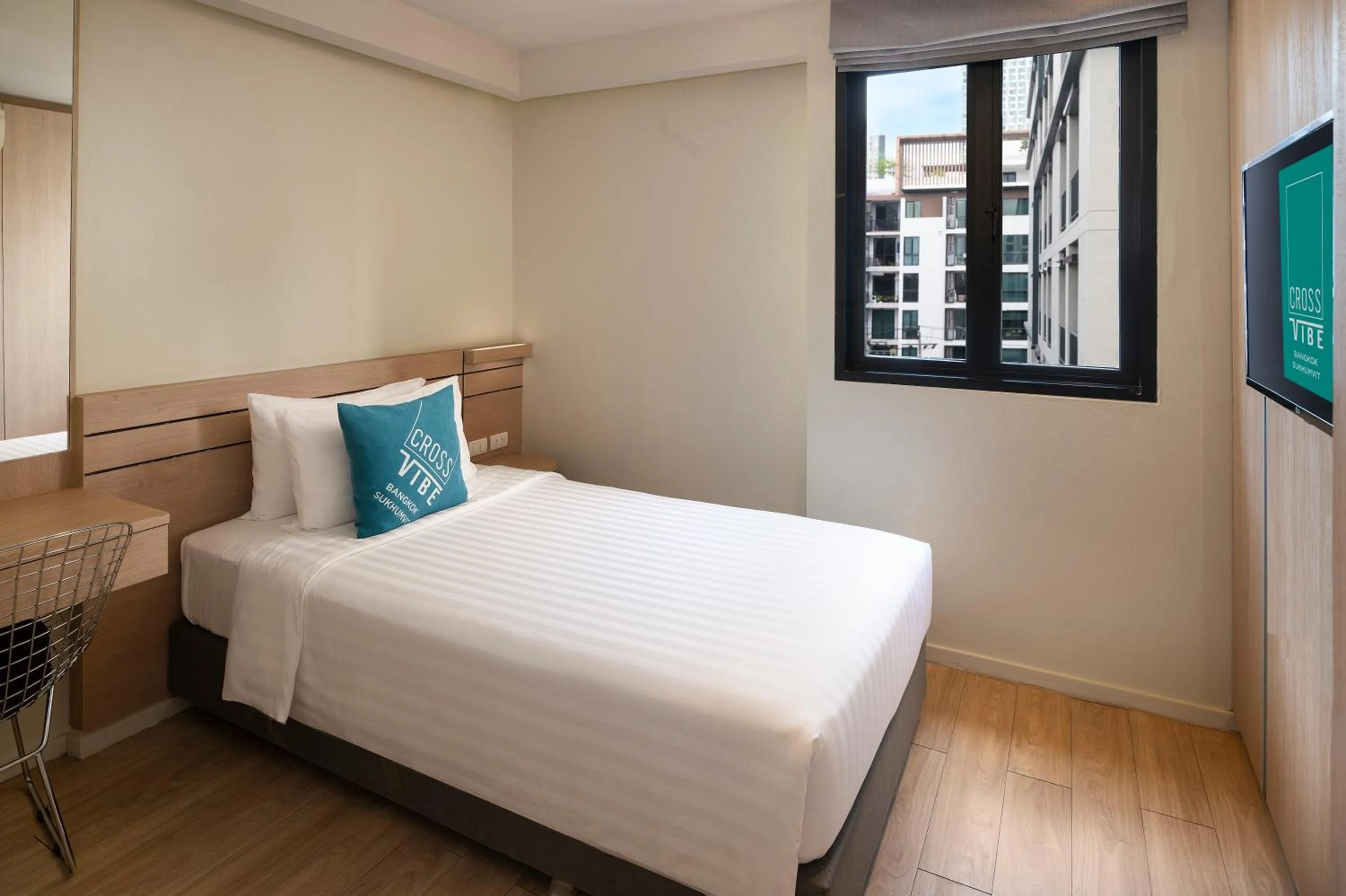 Bed in Cross Vibe Bangkok Sukhumvit