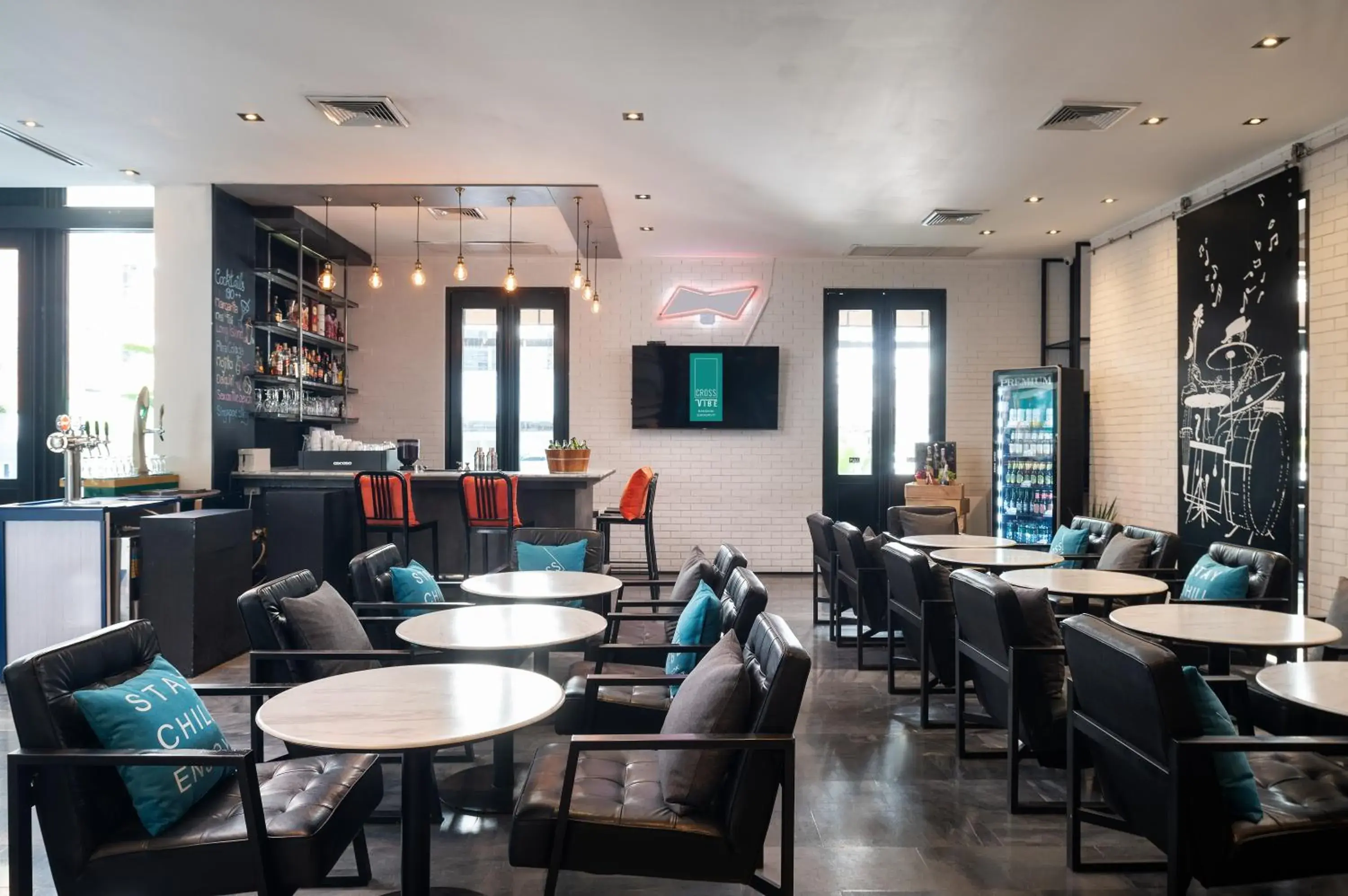 Lounge or bar in Cross Vibe Bangkok Sukhumvit Lounge or bar in Cross Vibe Bangkok Sukhumvit