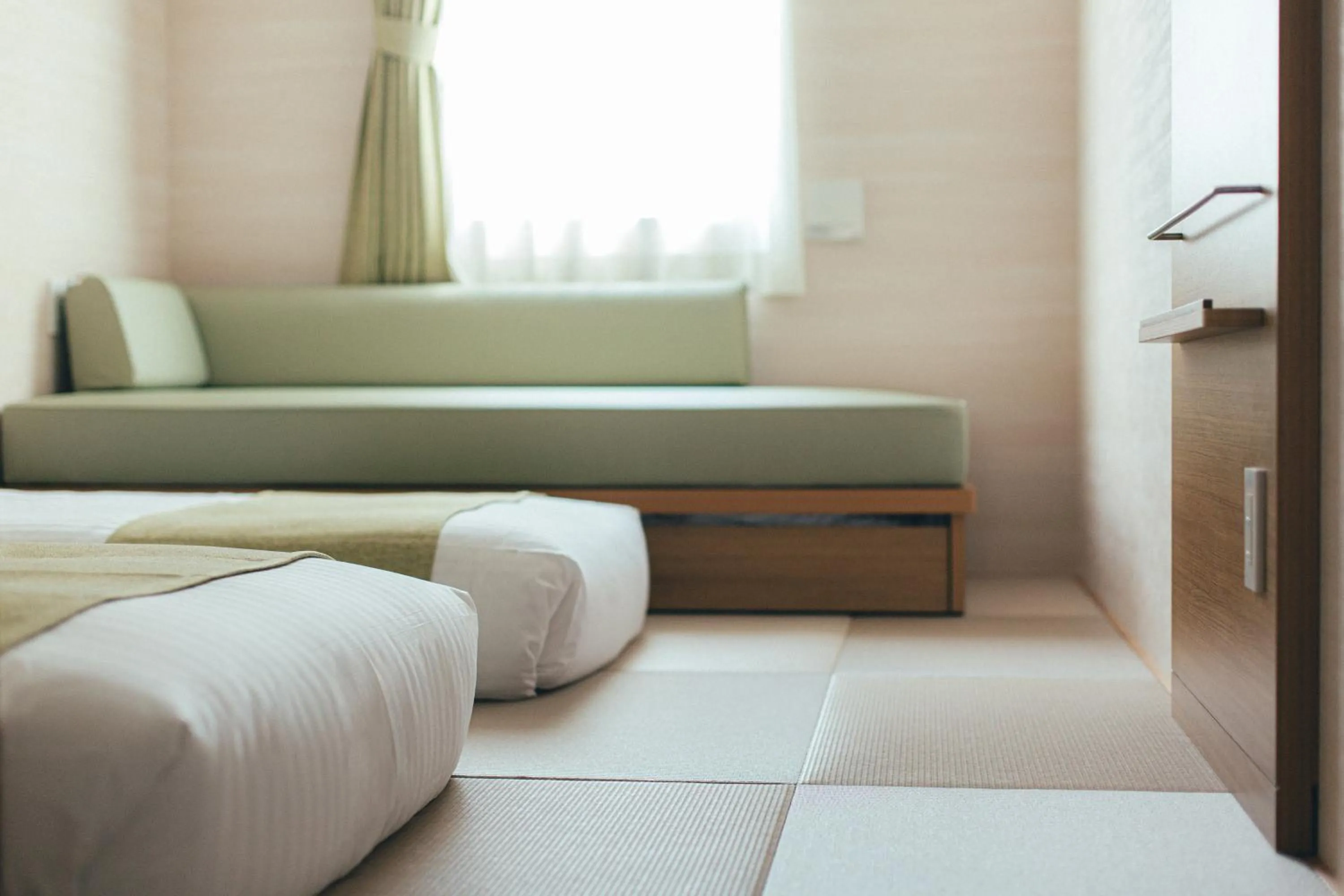 Bed in Kuretake Inn Okayama