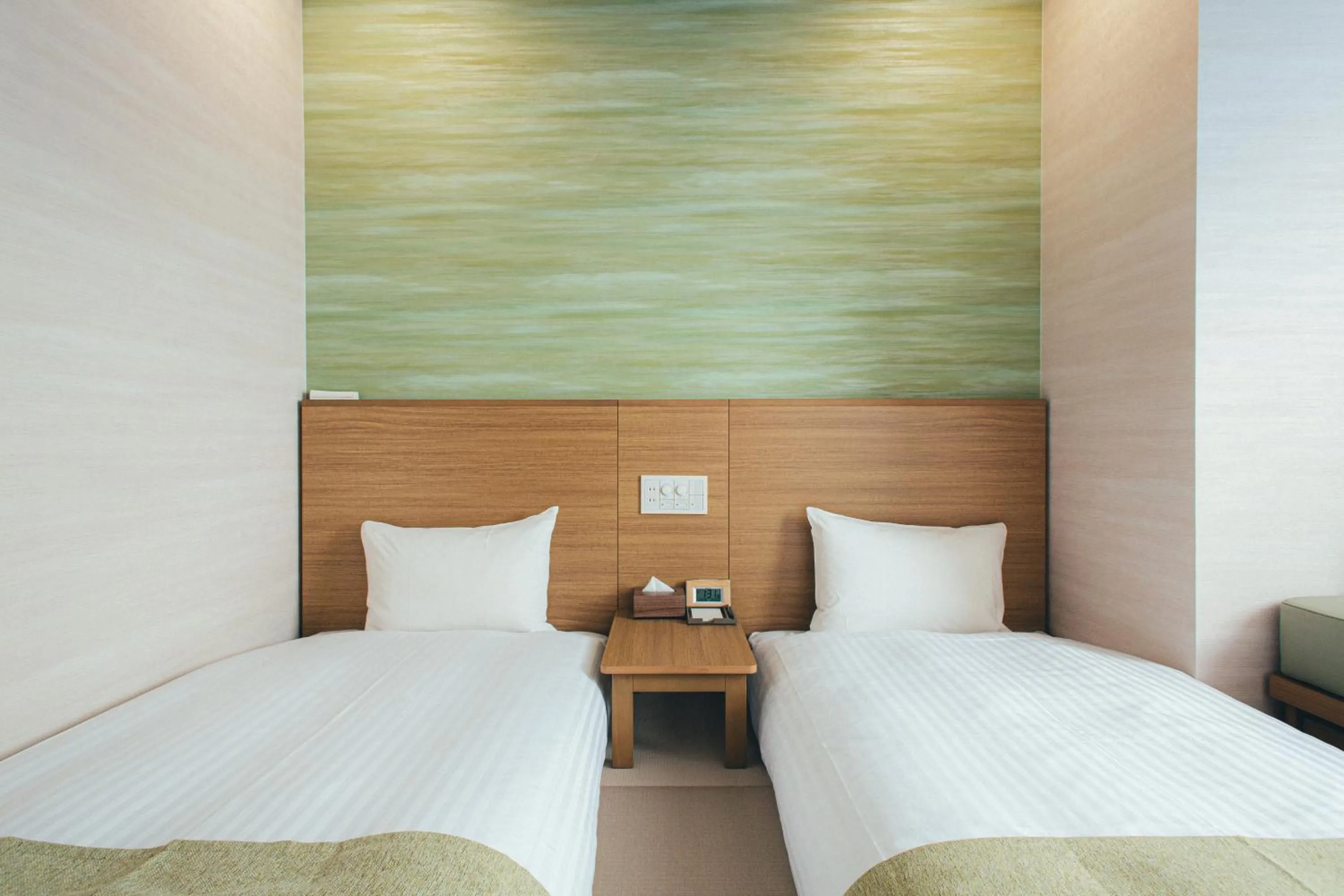 Bed in Kuretake Inn Okayama