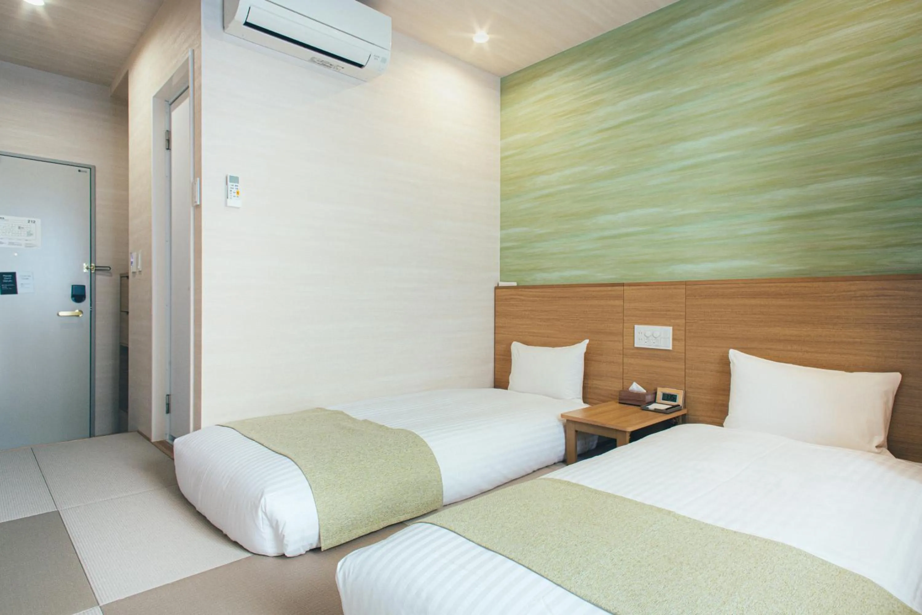 Bed in Kuretake Inn Okayama