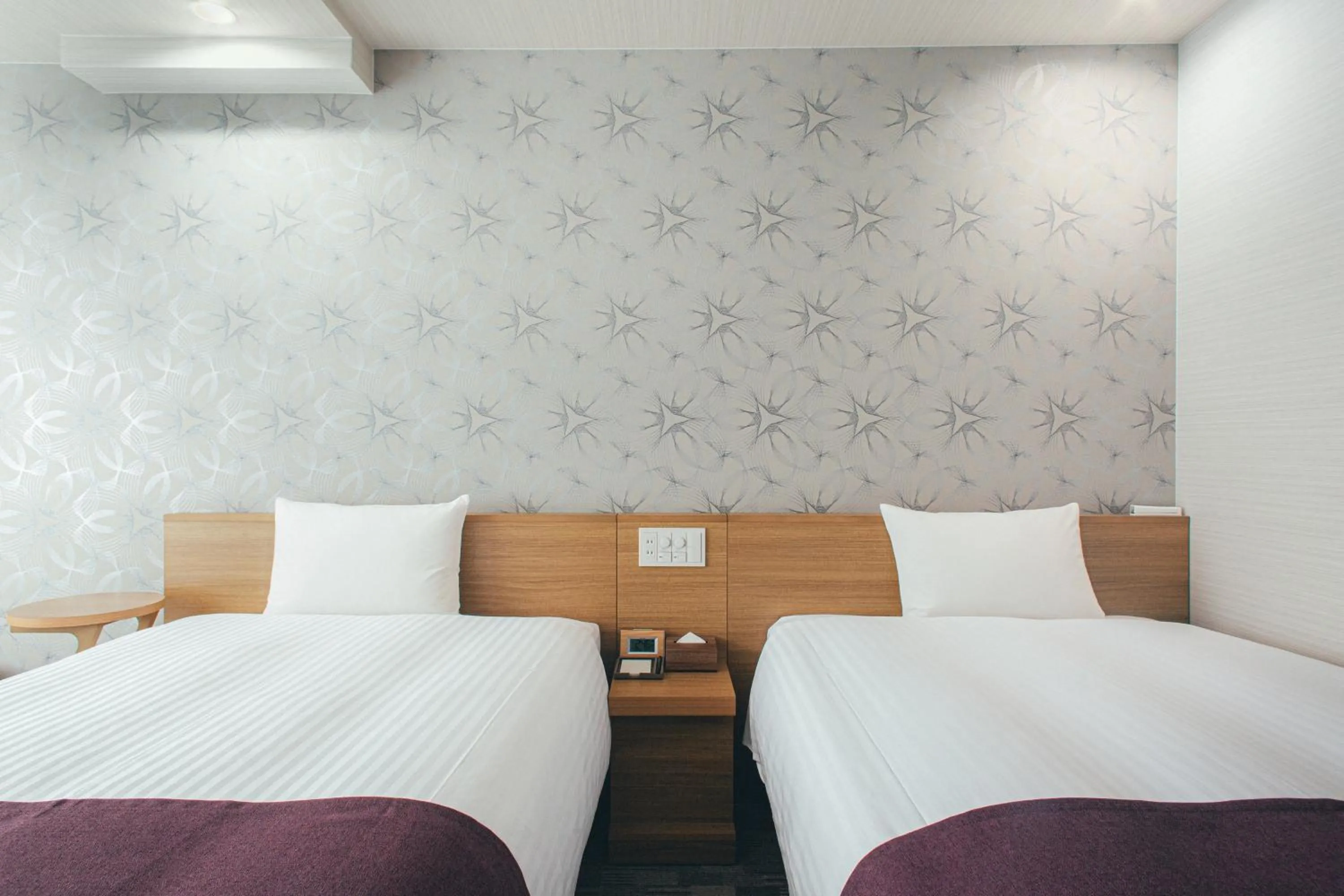 Bed in Kuretake Inn Okayama