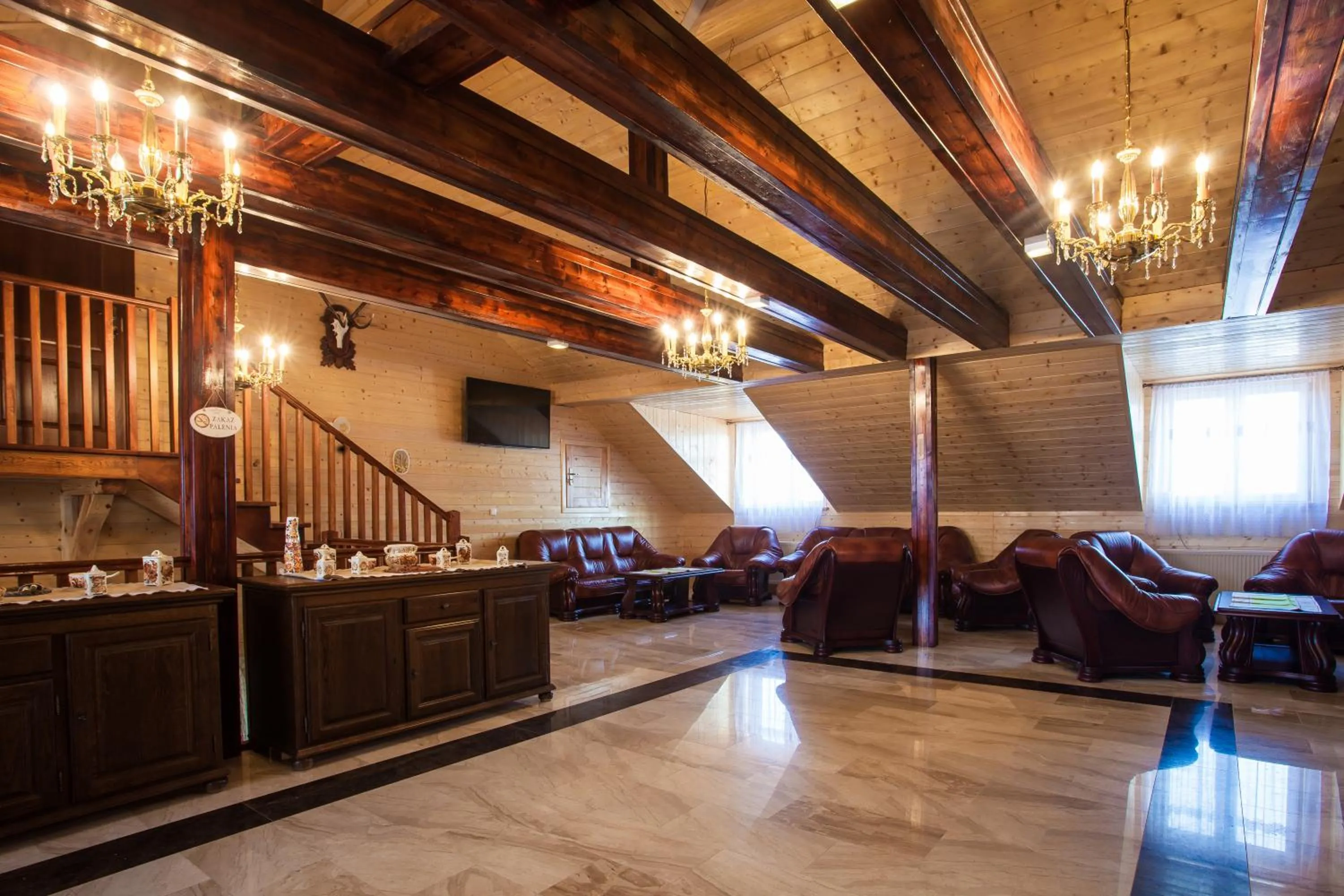 Communal lounge/ TV room in Pensjonat u Kraka