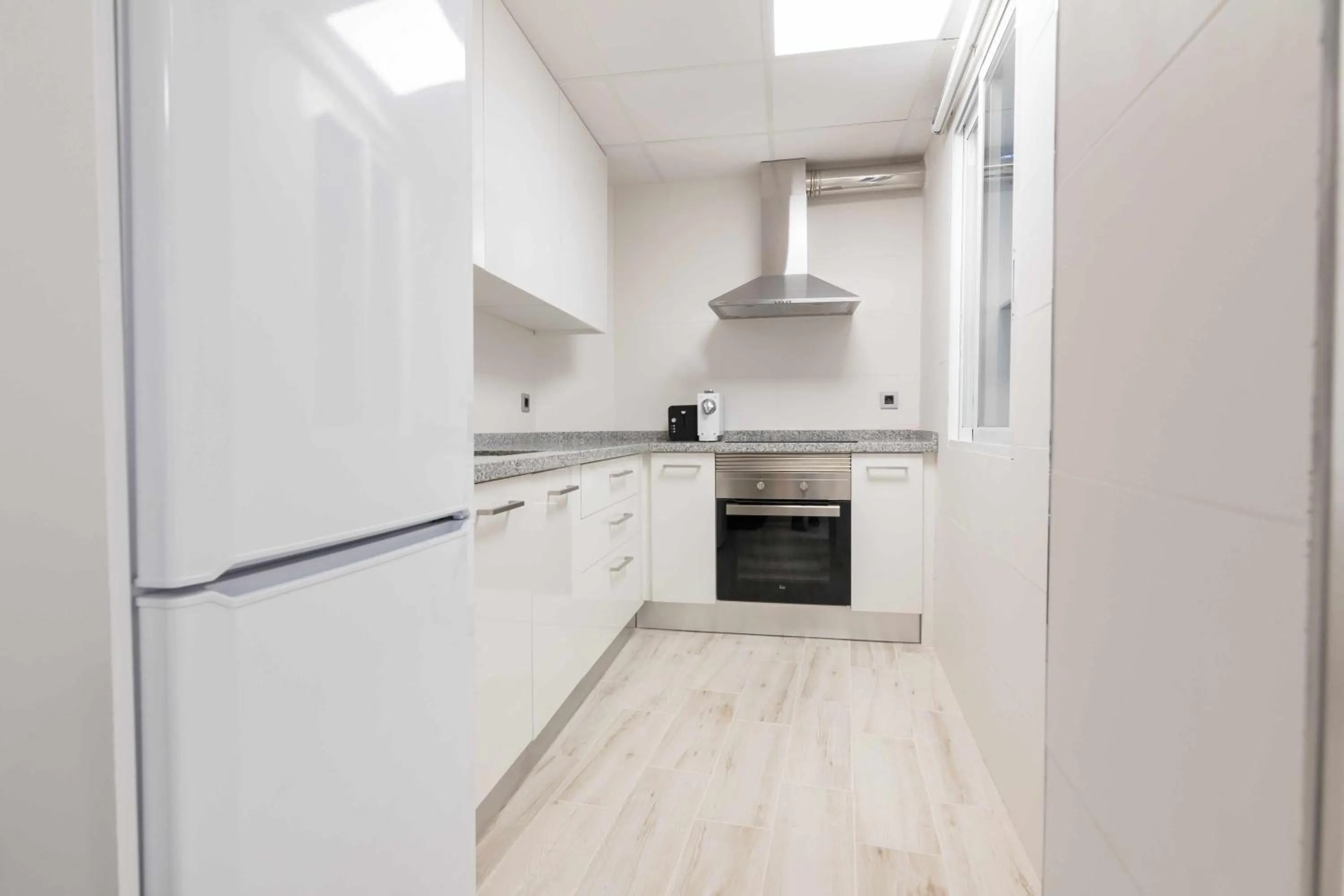 Kitchen or kitchenette in Apartamentos Arena y Cairo