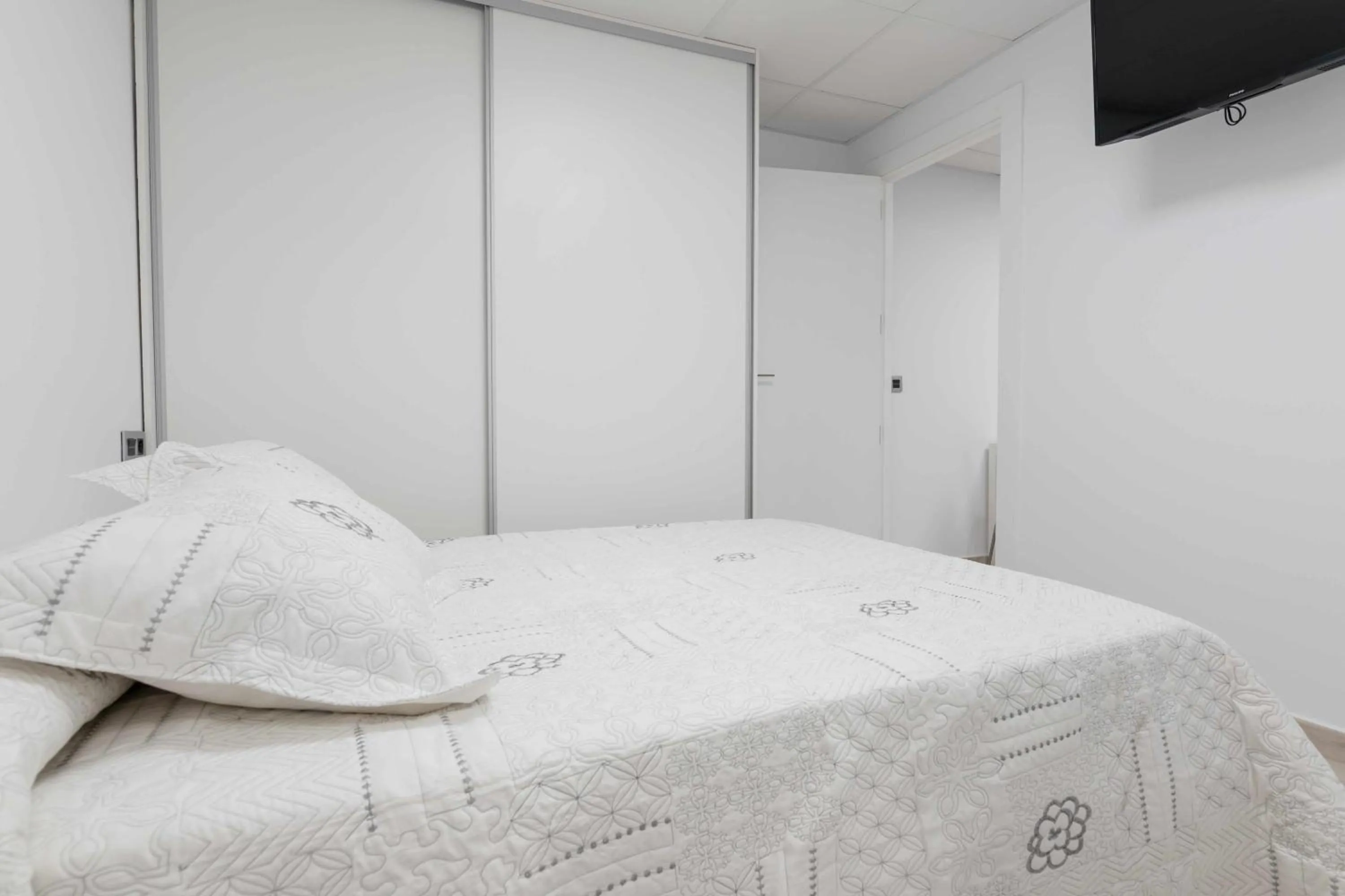Bed in Apartamentos Arena y Cairo
