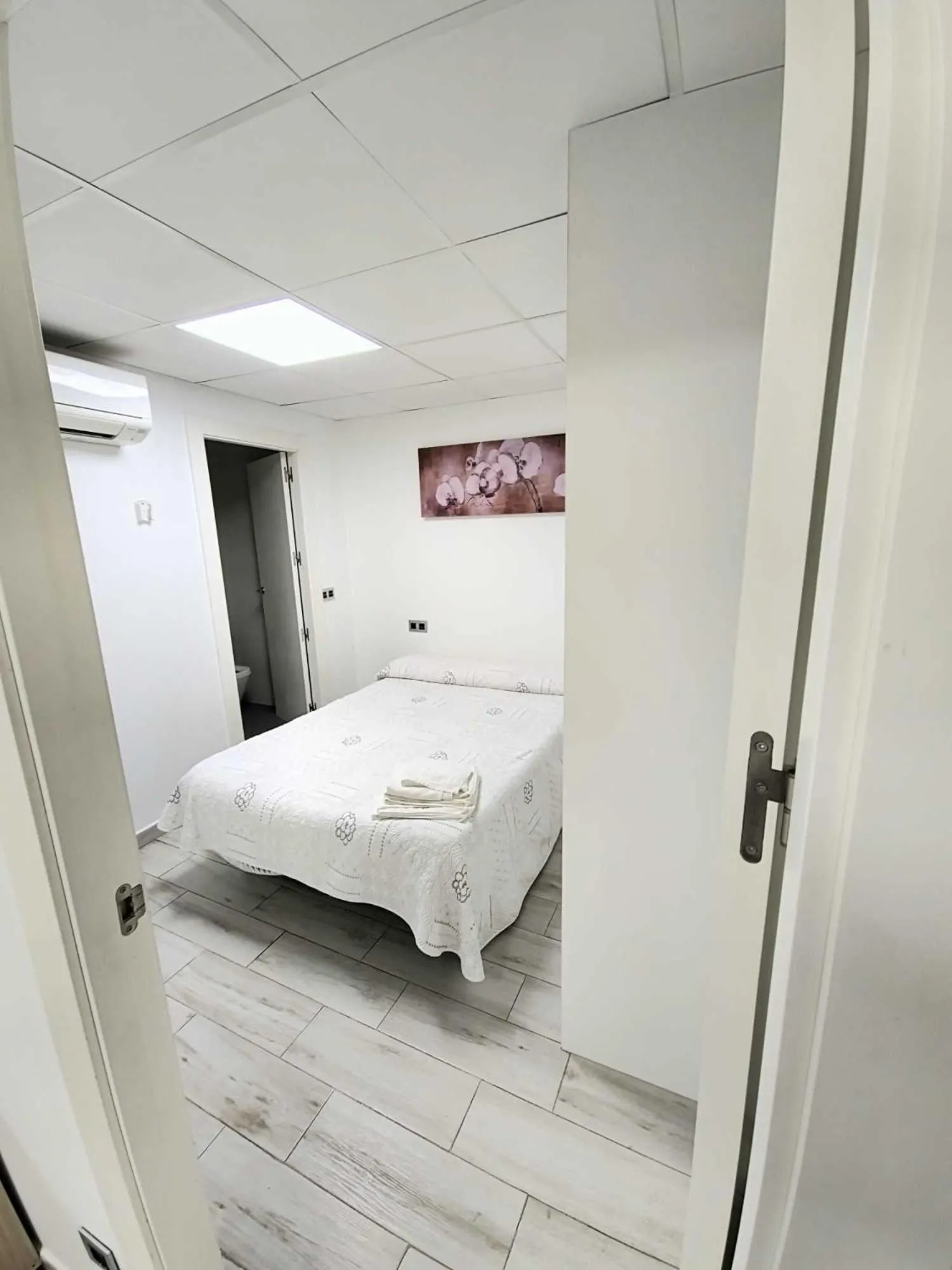 Bed in Apartamentos Arena y Cairo