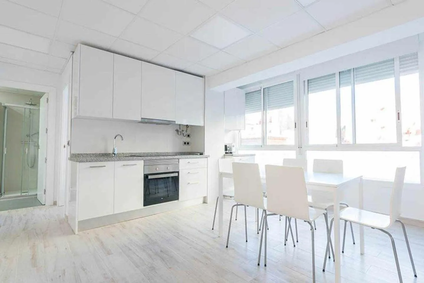 Kitchen or kitchenette in Apartamentos Arena y Cairo