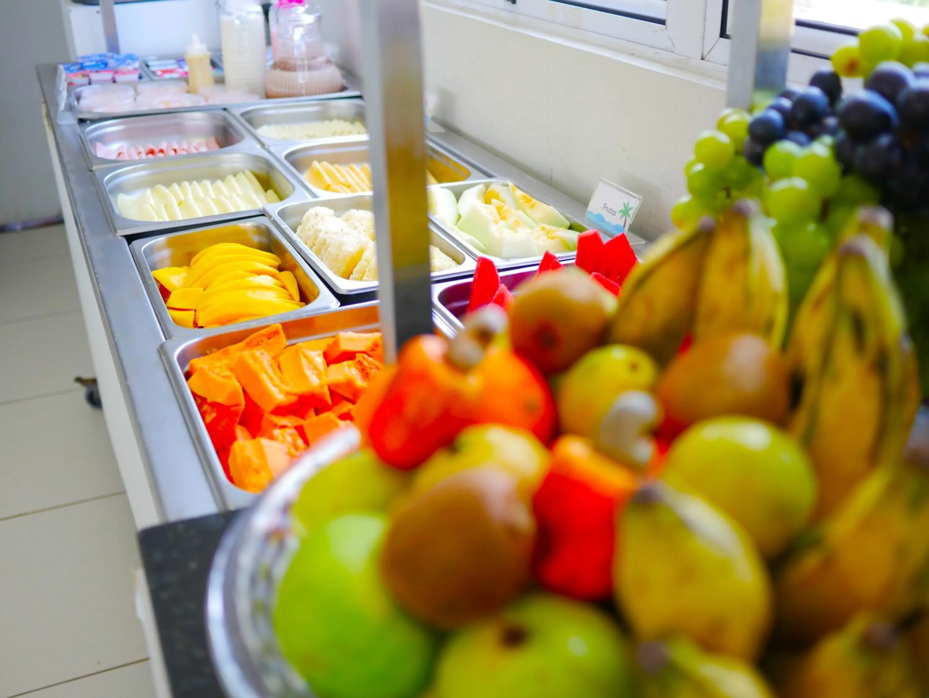 Buffet breakfast in Pousada Marie Claire Flats