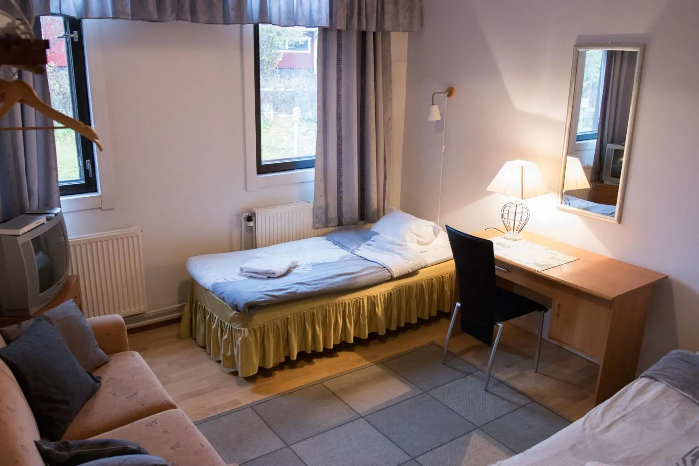 Budget Twin Room with Shared Bathroom in Gasthaus Mikkeli Budget Twin Room with Shared Bathroom in Gasthaus Mikkeli