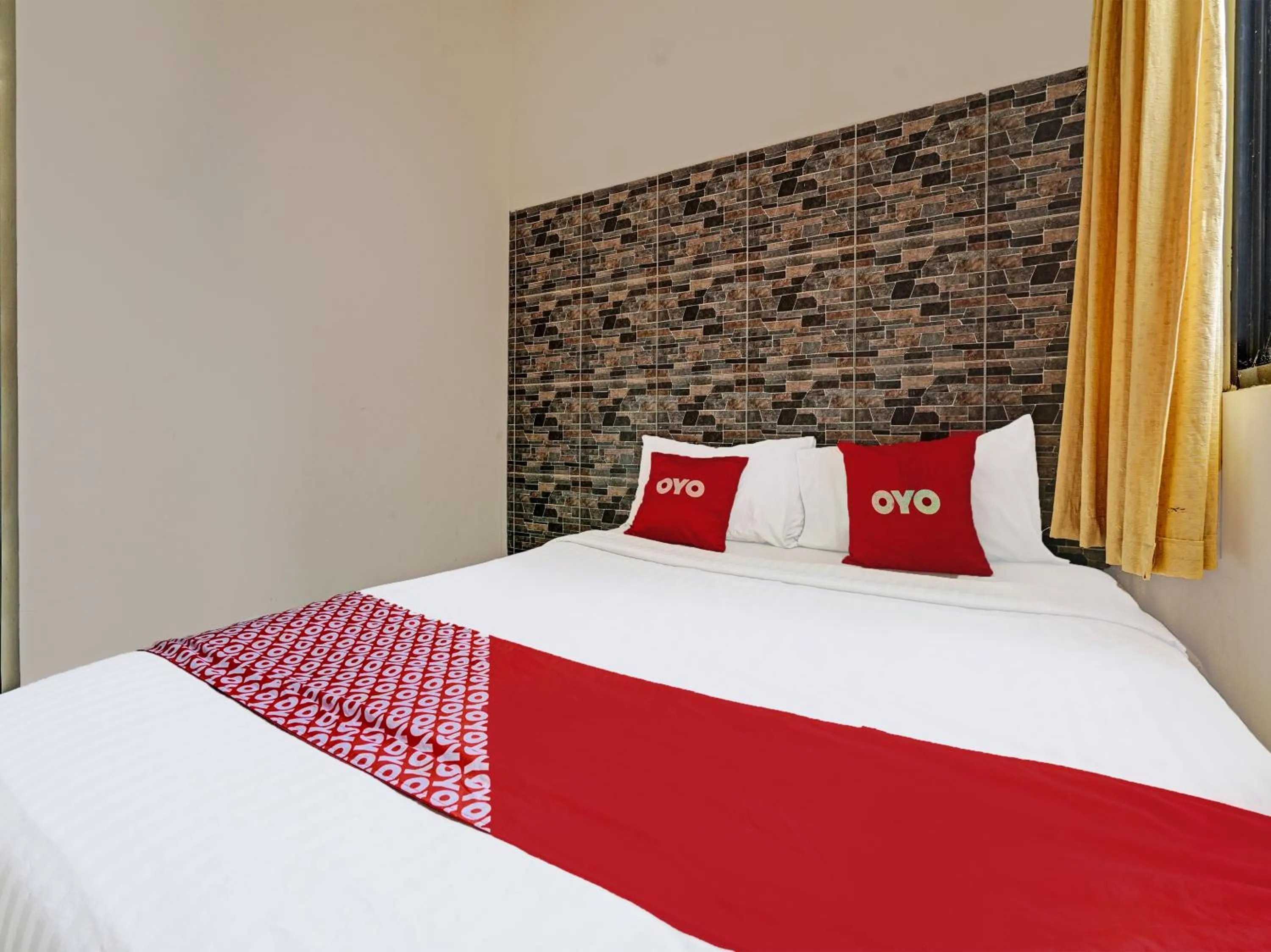 Bedroom in OYO 1699 Verona Residence