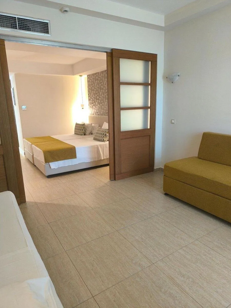 Photo of the whole room, Bed in Asterias Beach Resort