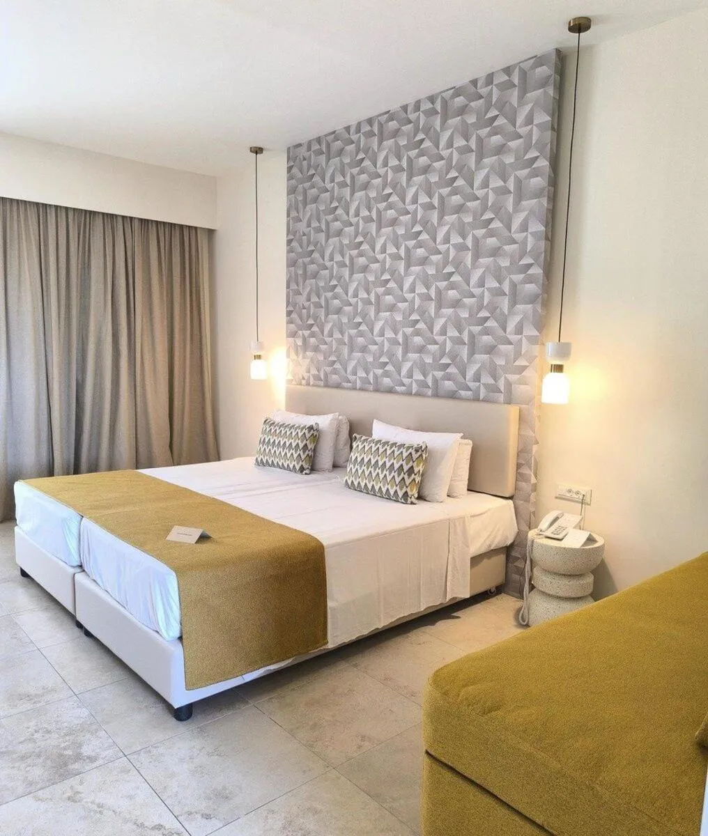 Photo of the whole room, Bed in Asterias Beach Resort