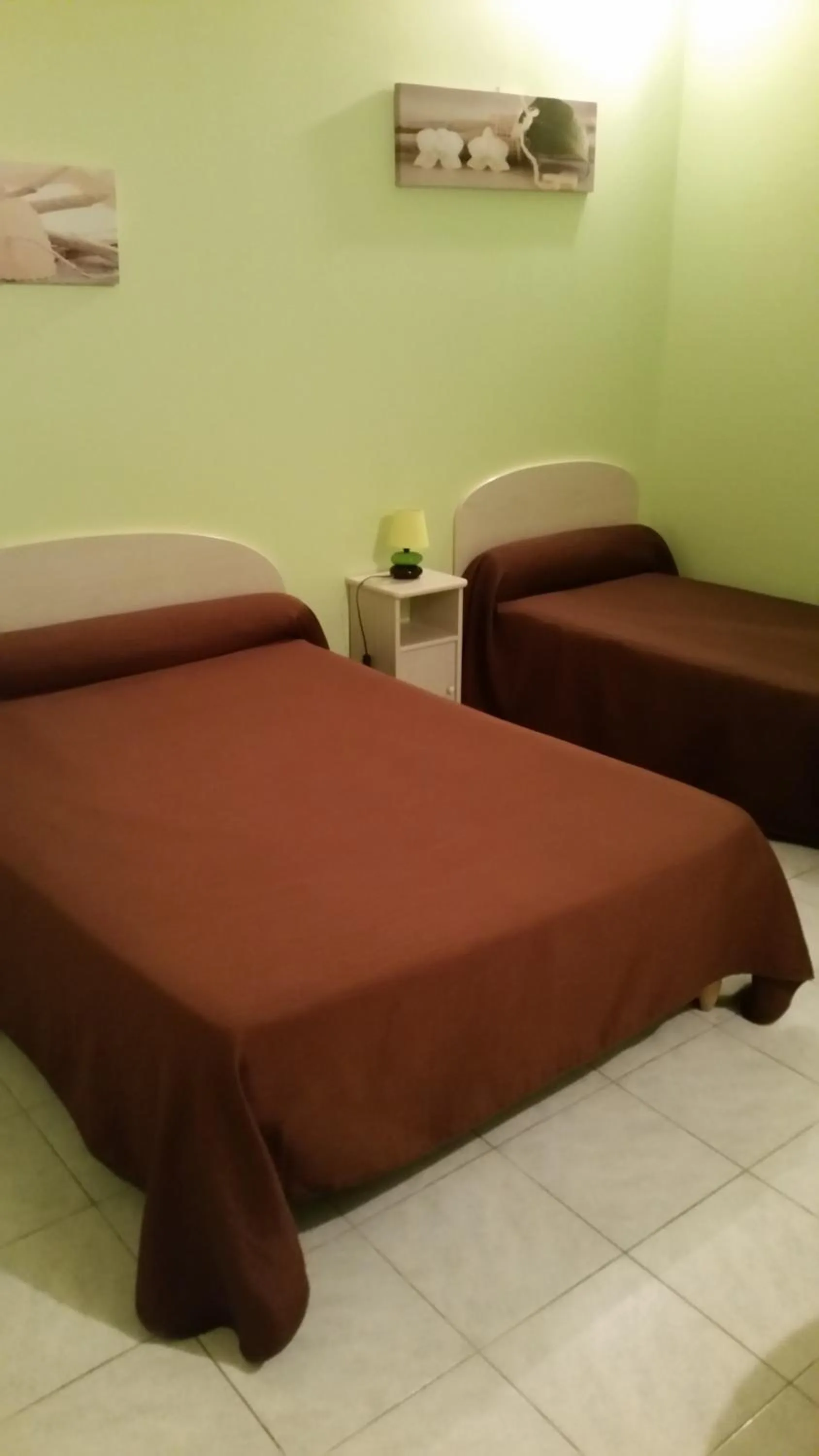 Bed in Hostellerie des Colonnes