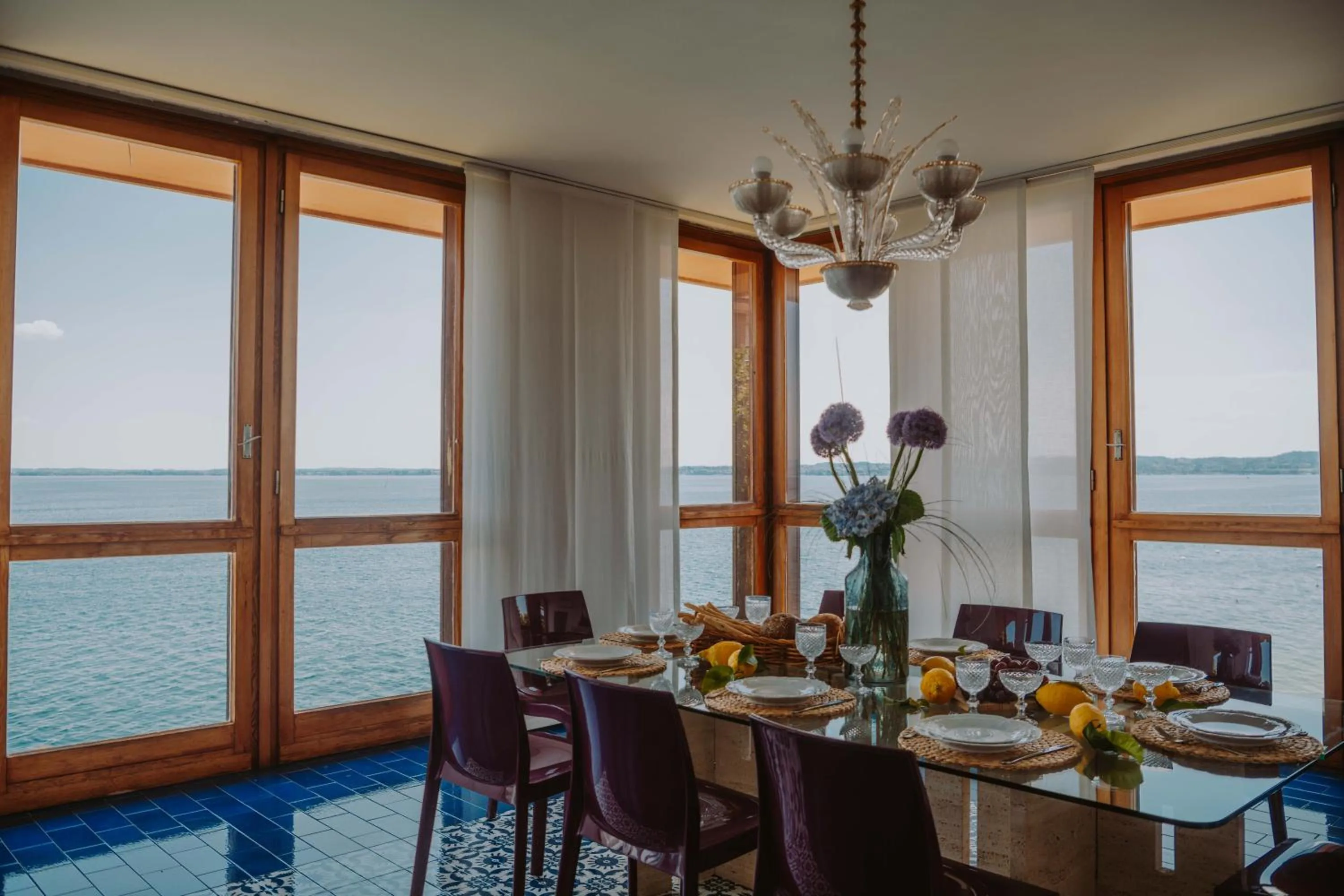 Dining area in Holiday Garda Villa Dolcelago Lake Front