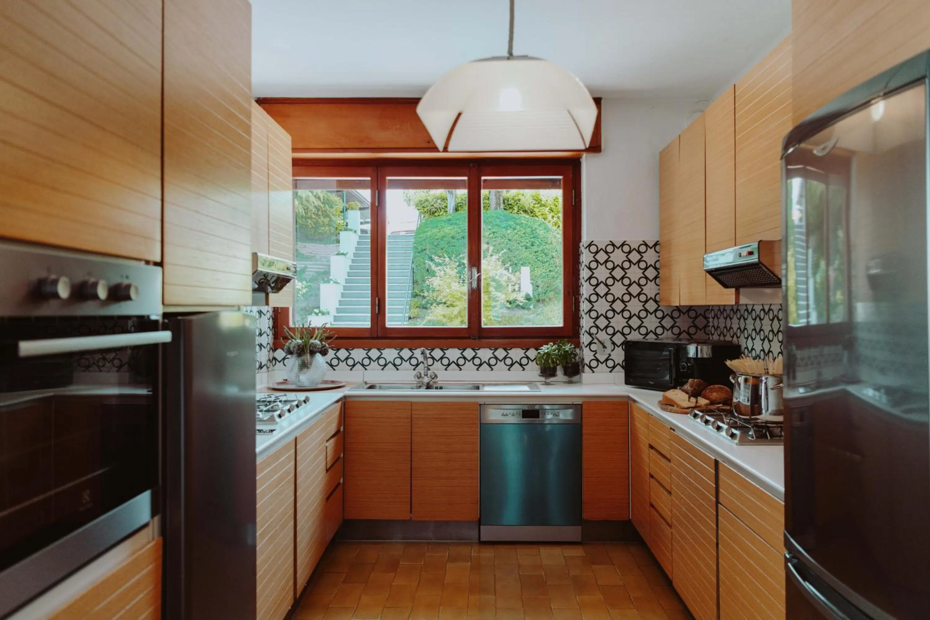 Kitchen or kitchenette in Holiday Garda Villa Dolcelago Lake Front