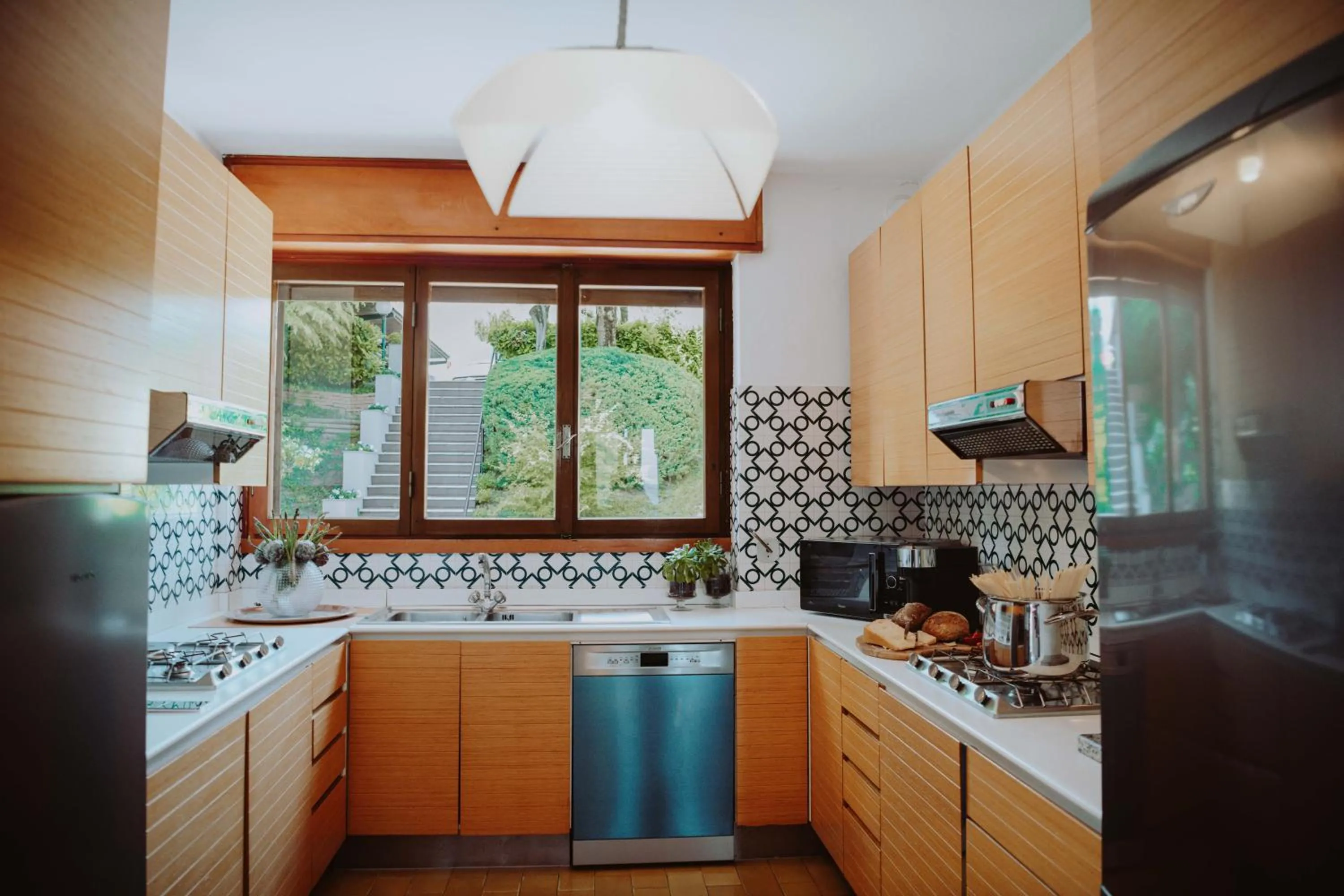 Kitchen or kitchenette in Holiday Garda Villa Dolcelago Lake Front