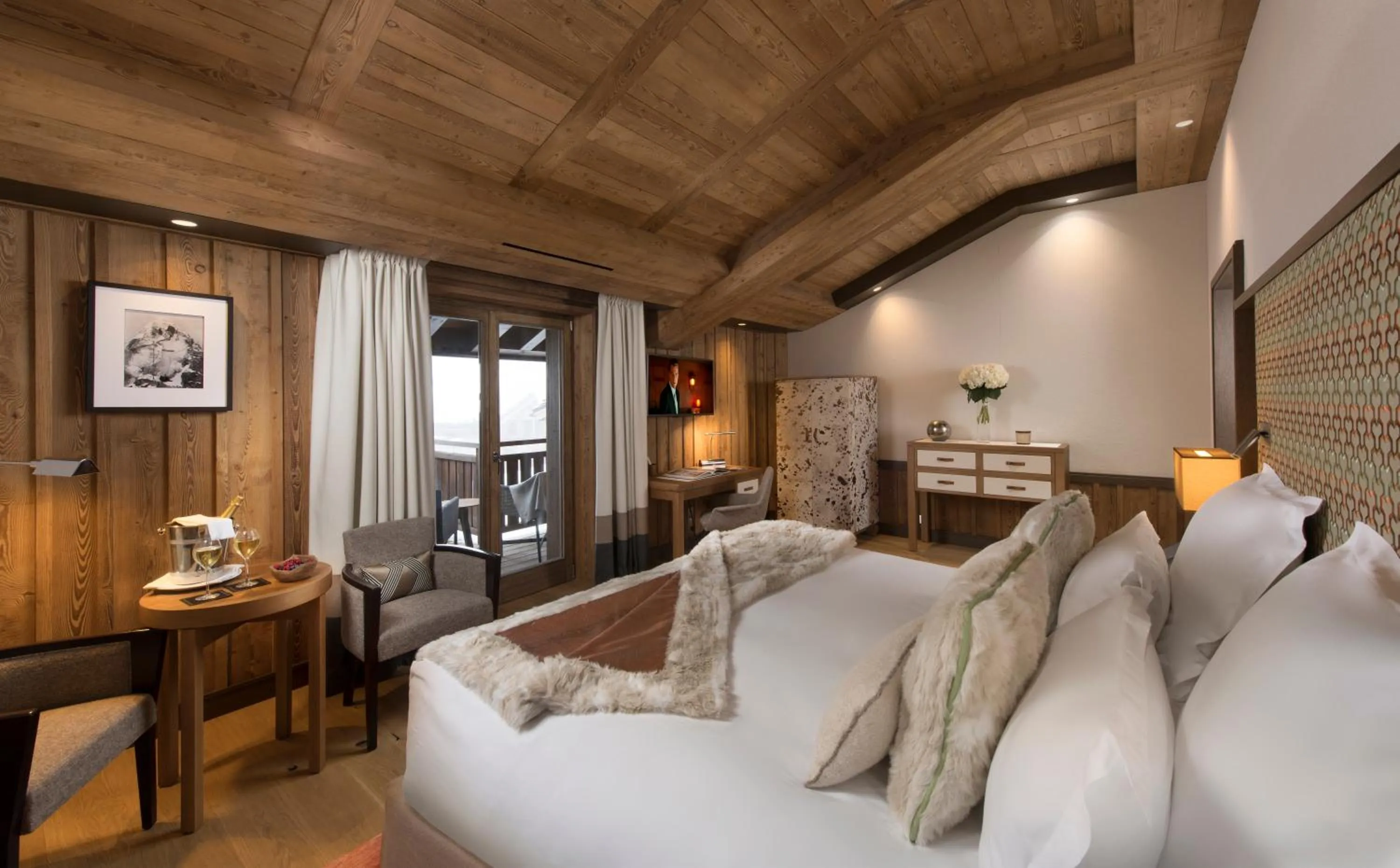 Photo of the whole room, Bed in Hôtel Barrière Les Neiges Courchevel
