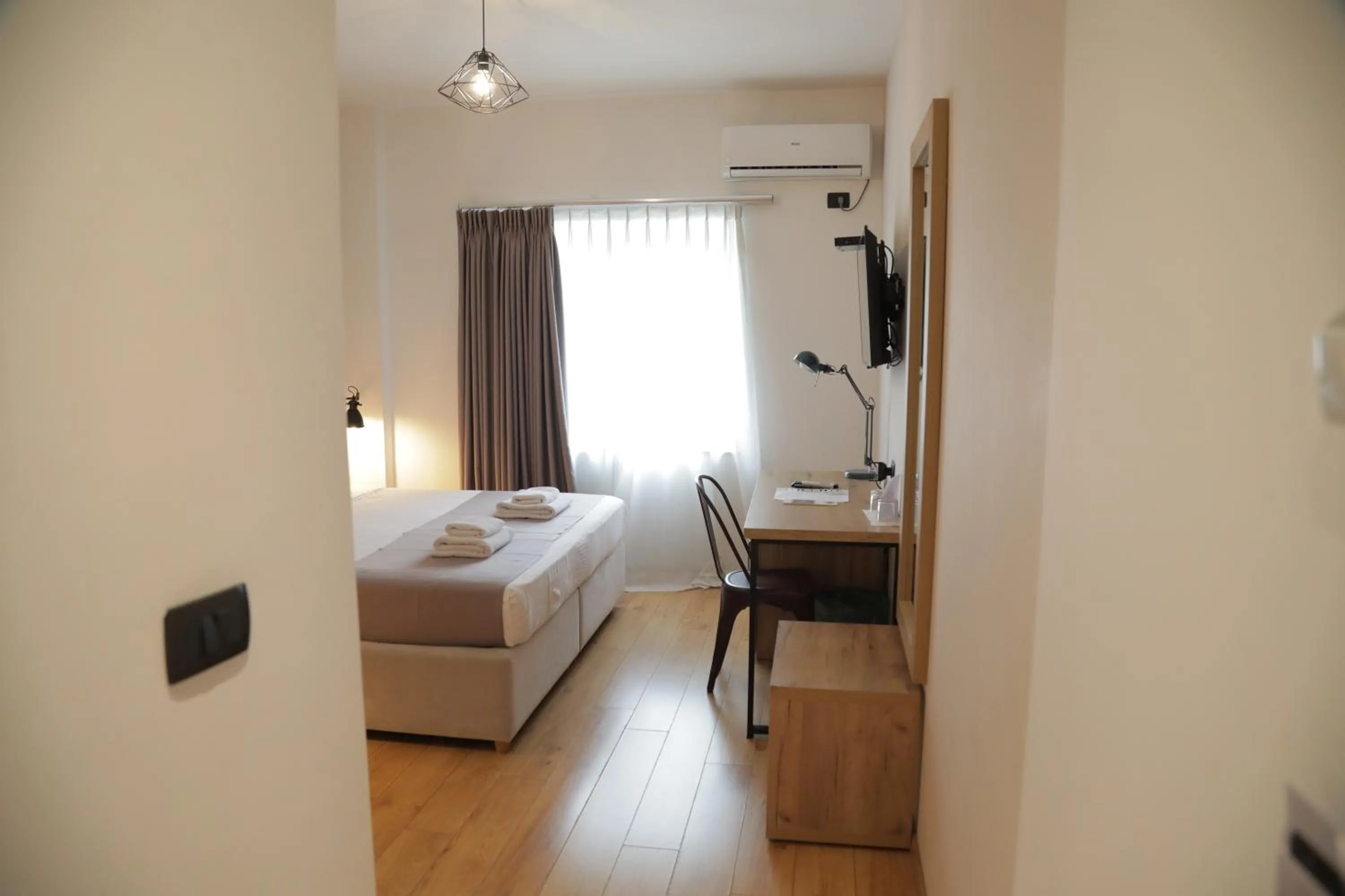 Bed in Oda Hotel Tirana