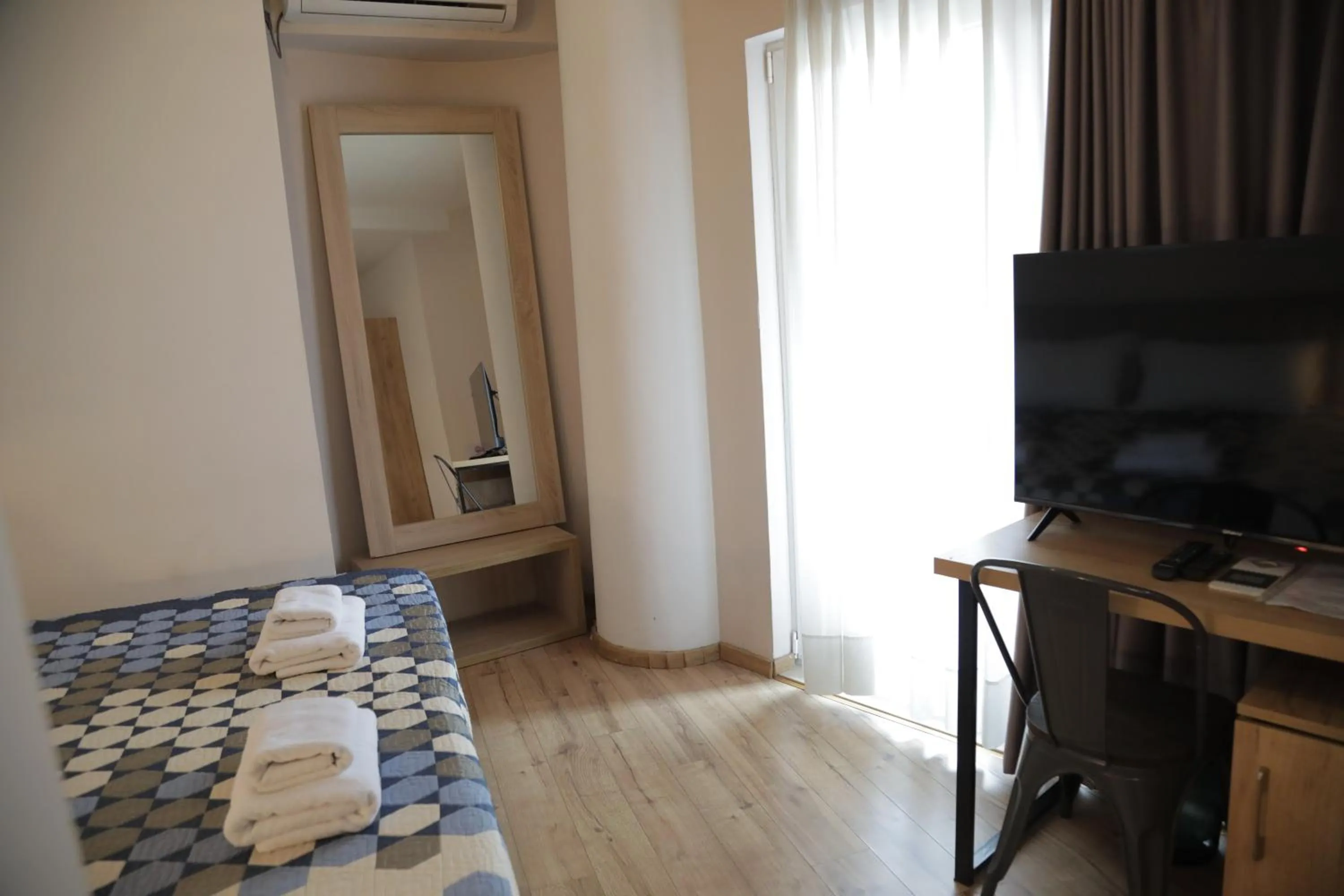 Bed in Oda Hotel Tirana