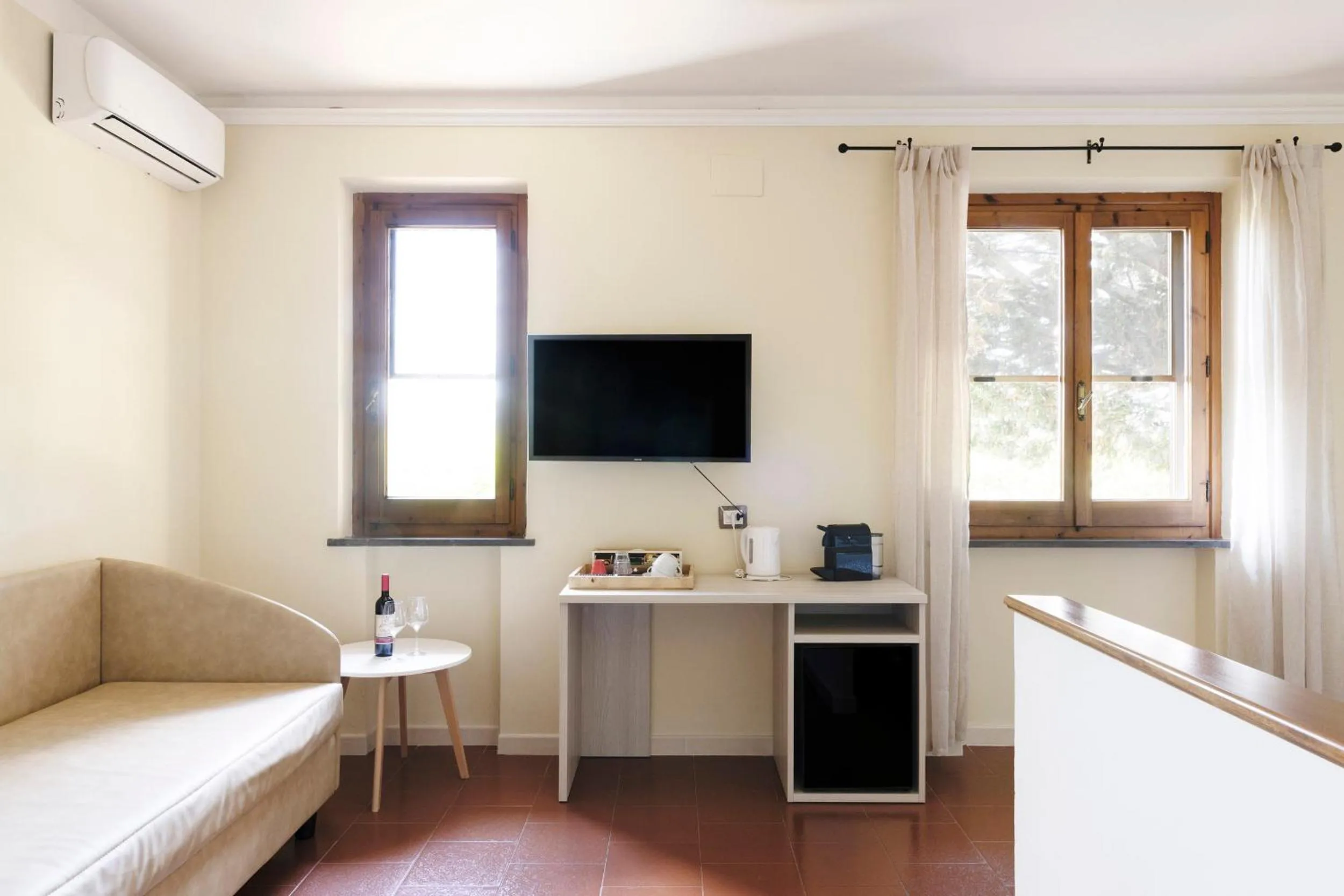 Living room, Bed in Tenuta Lamborghini Golf & Resort