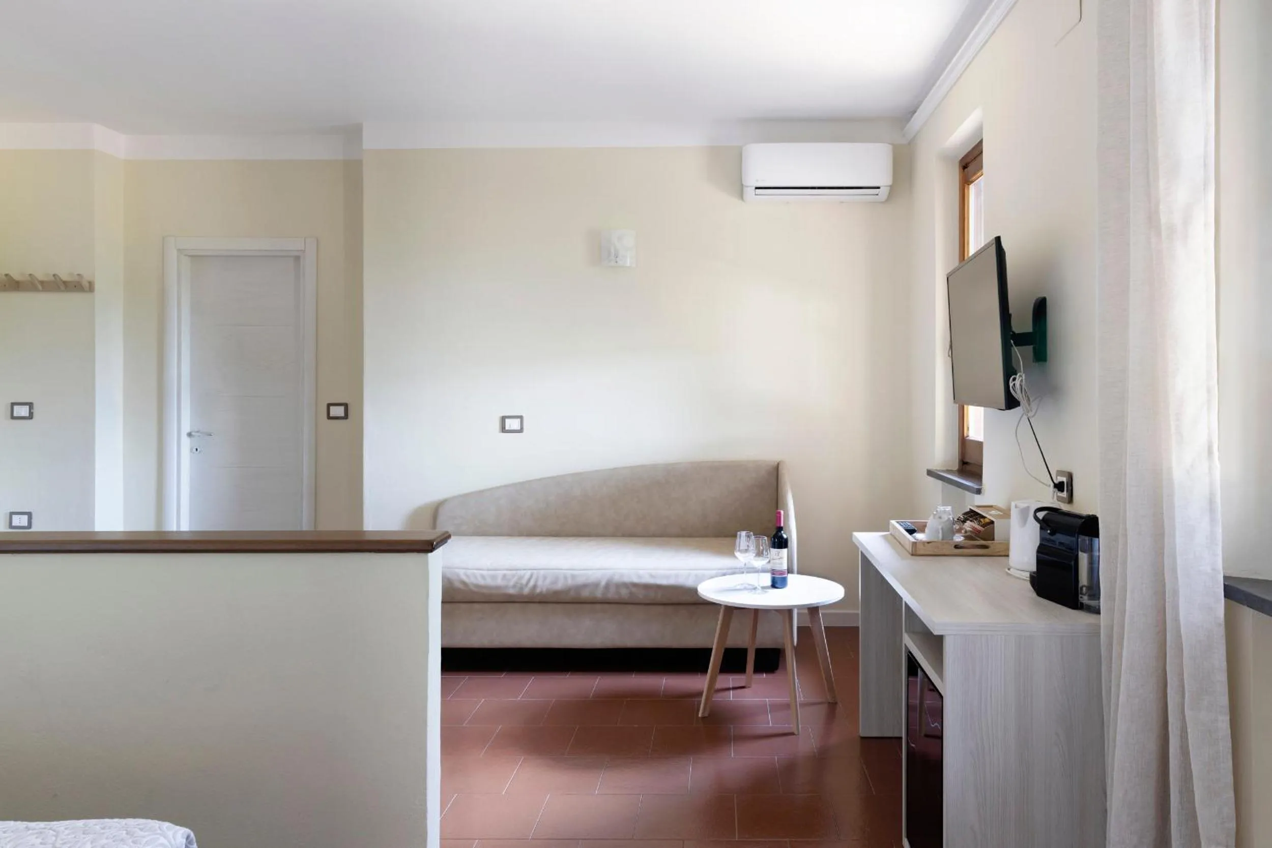 Living room, Bed in Tenuta Lamborghini Golf & Resort