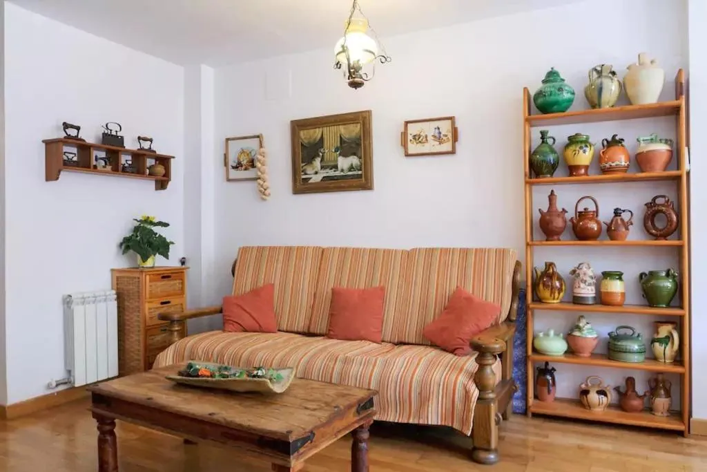 Communal lounge/ TV room in Ca la Gloria