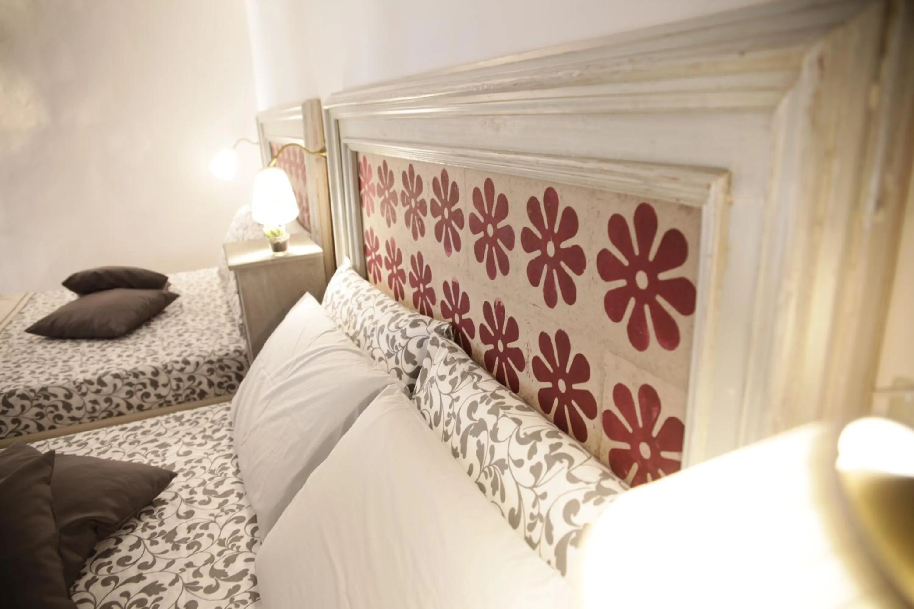 Decorative detail, Bed in Palazzo Mandurino luxury relais