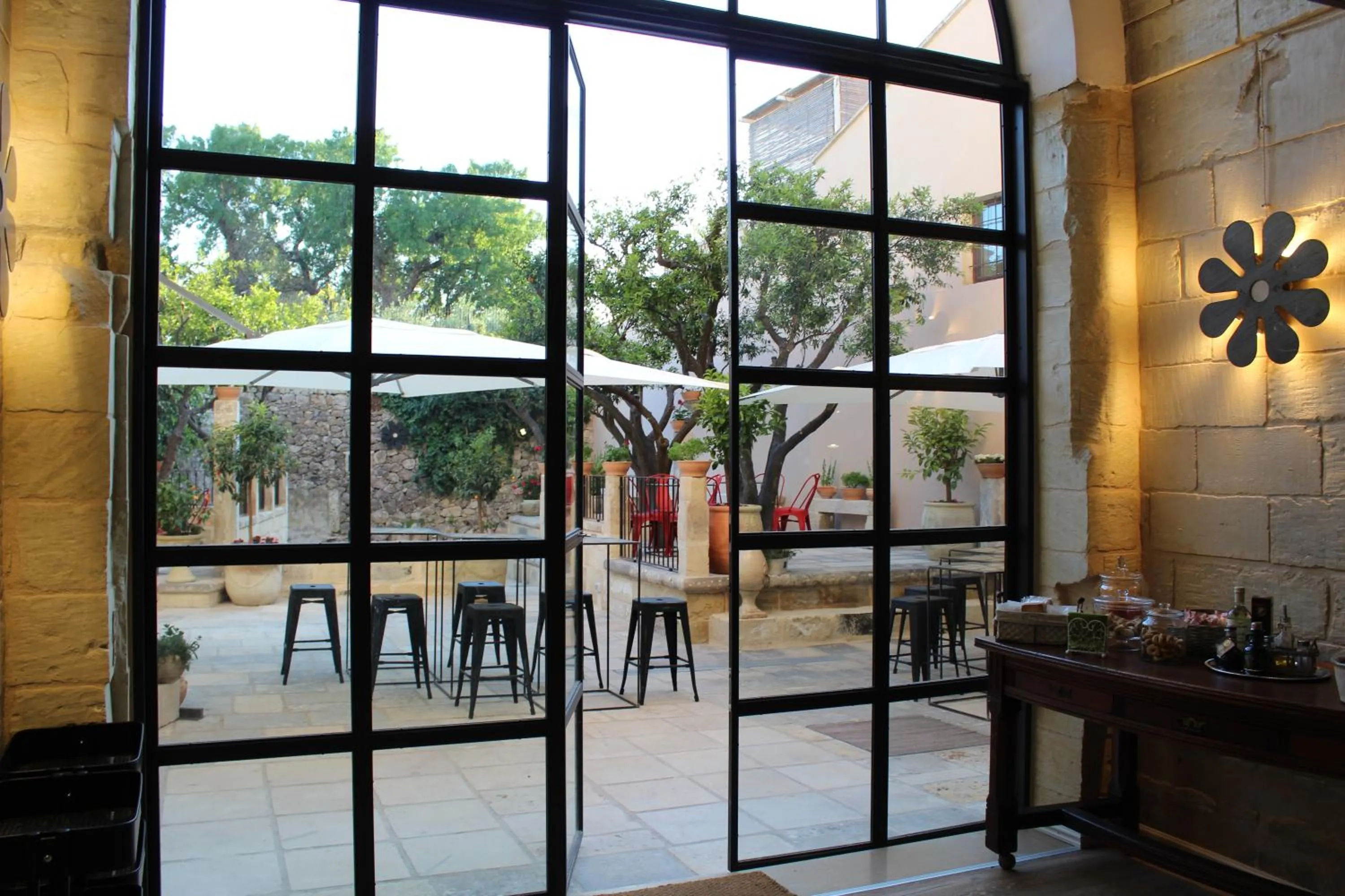 Communal lounge/ TV room in Palazzo Mandurino luxury relais