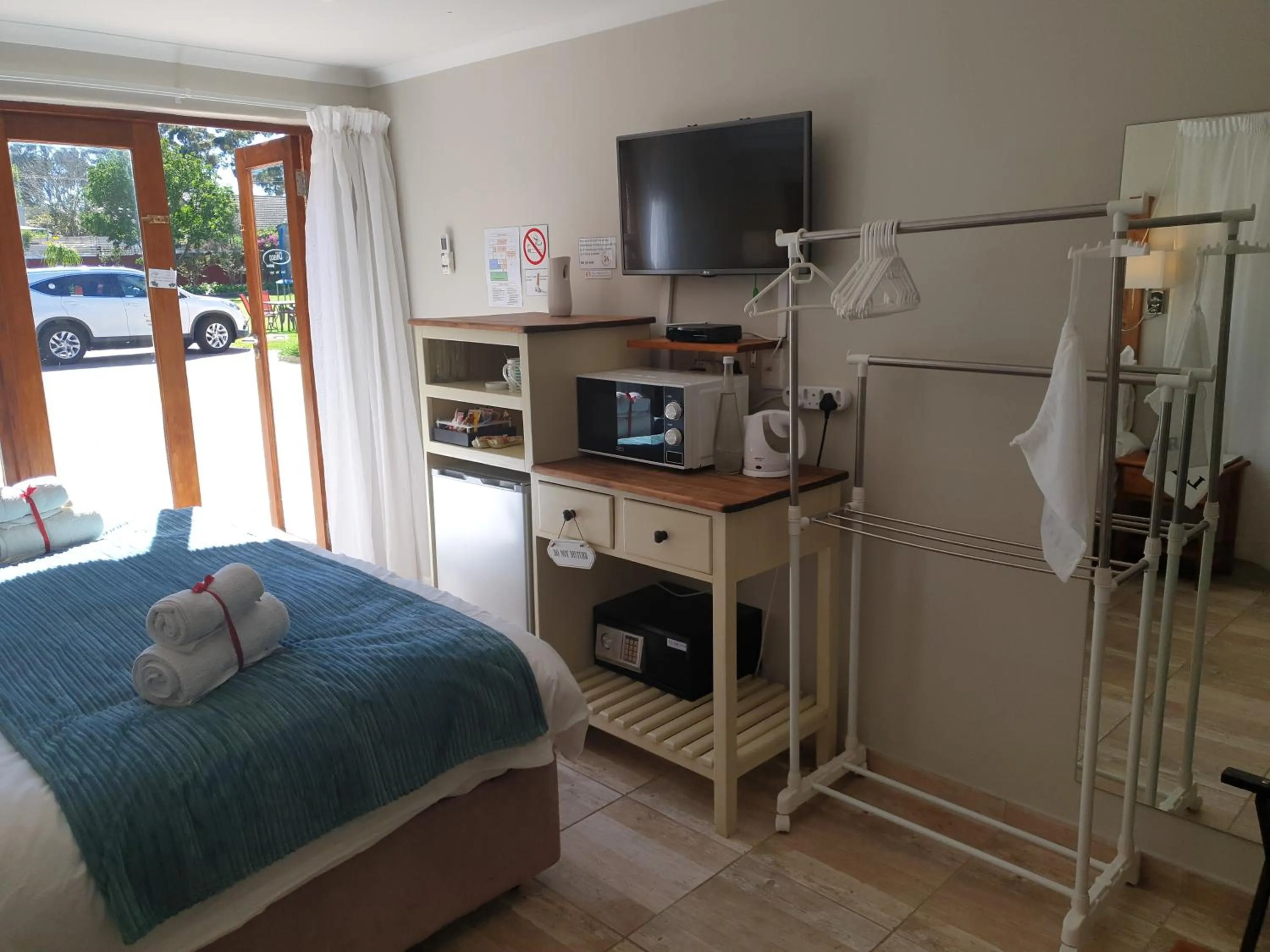 TV and multimedia, Bed in Dilisca Guesthouse