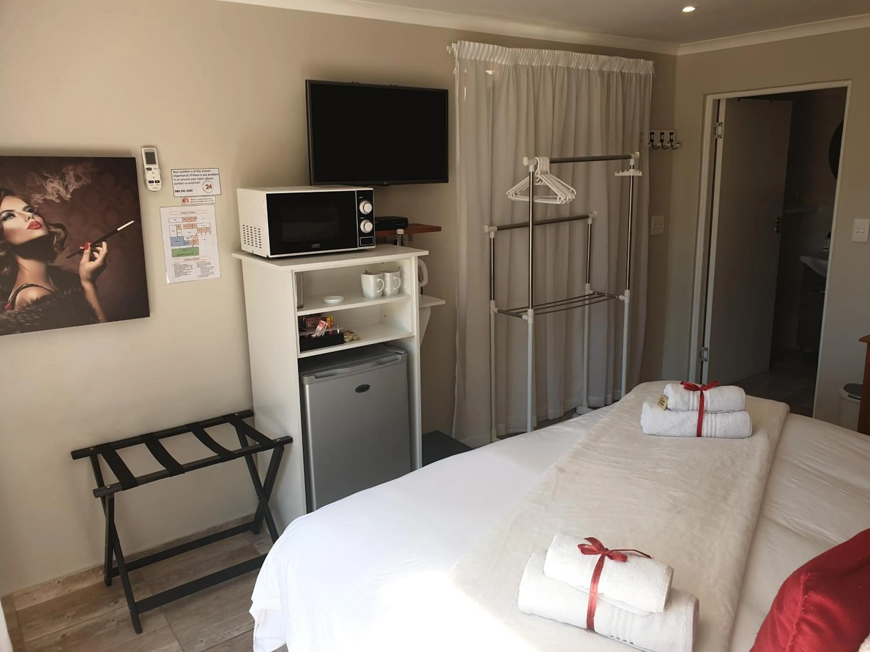 TV and multimedia, Bed in Dilisca Guesthouse