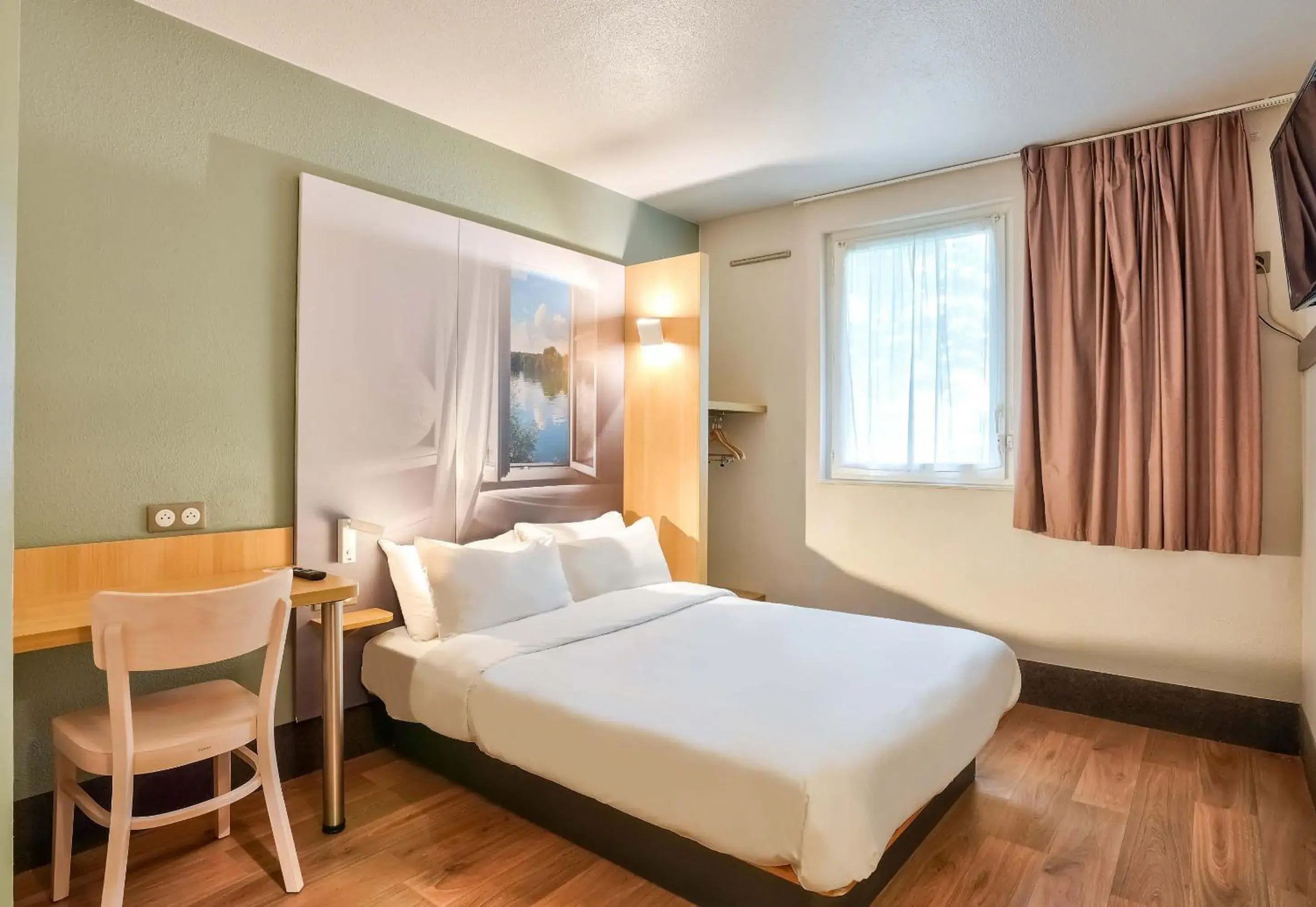 Bedroom, Bed in B&B HOTEL Goussainville CDG Bedroom, Bed in B&B HOTEL Goussainville CDG