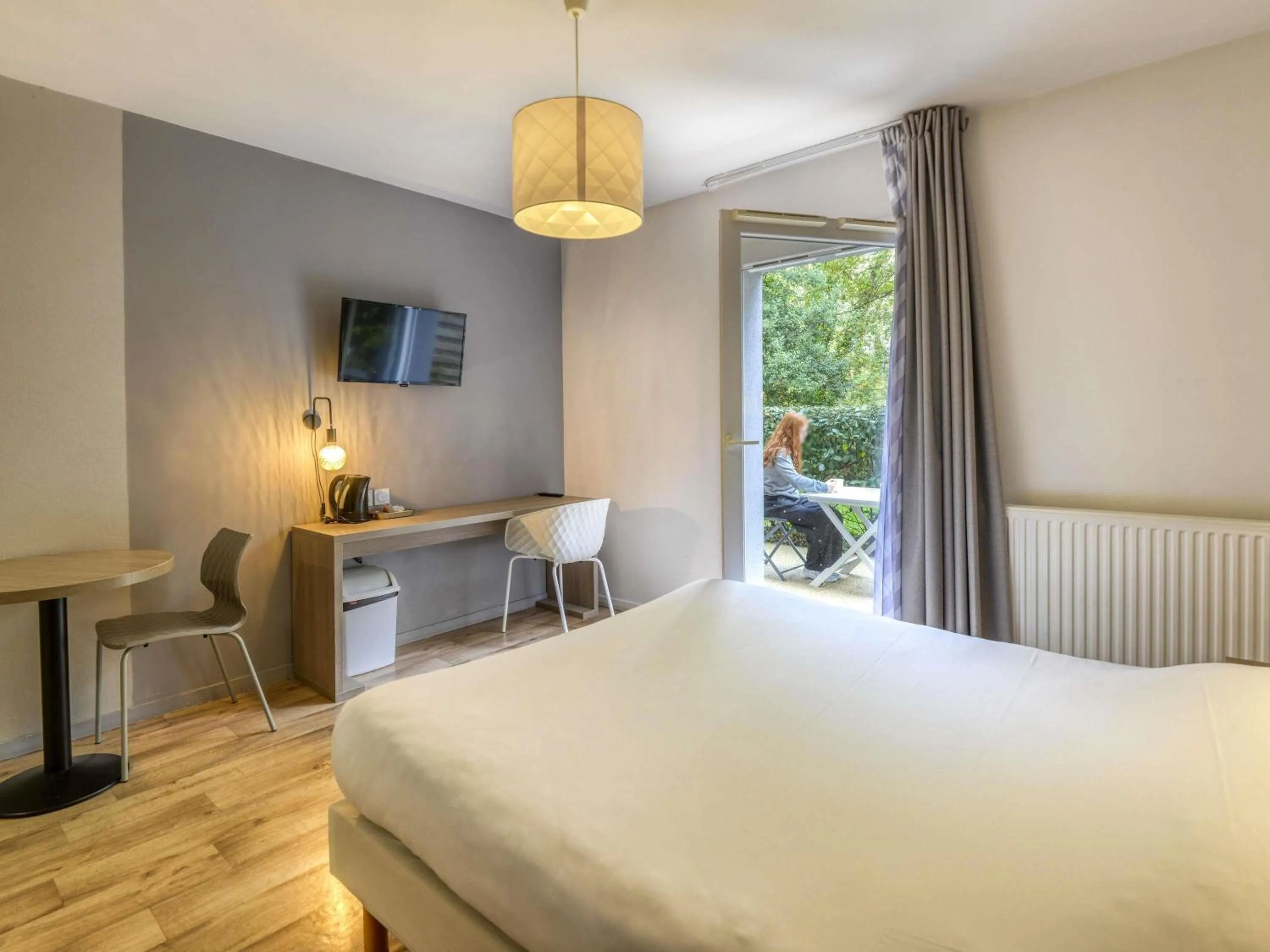 Bedroom, Bed in Aparthotel Adagio Access Saint Nazaire
