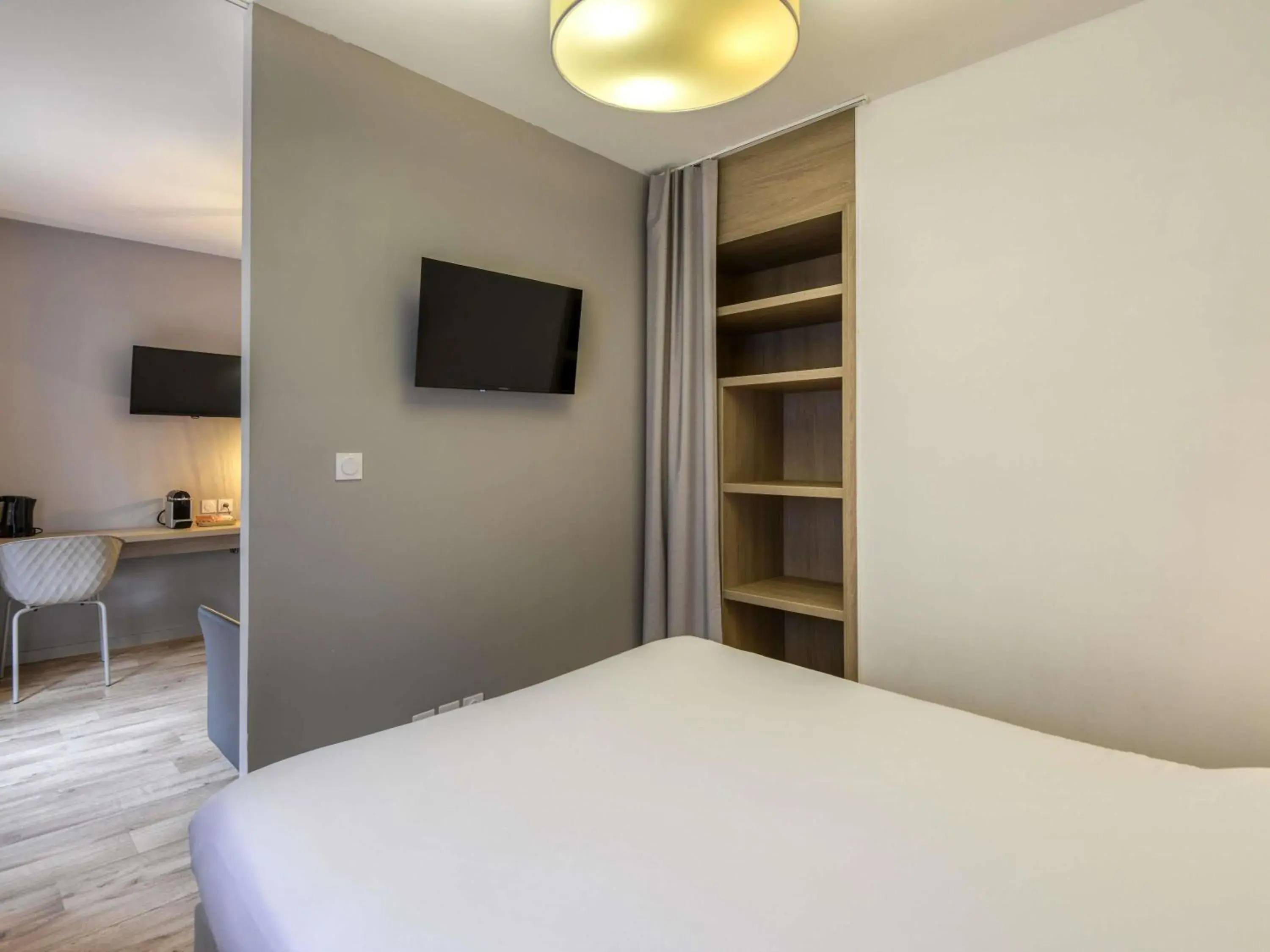 Bedroom, Bed in Aparthotel Adagio Access Saint Nazaire Bedroom, Bed in Aparthotel Adagio Access Saint Nazaire