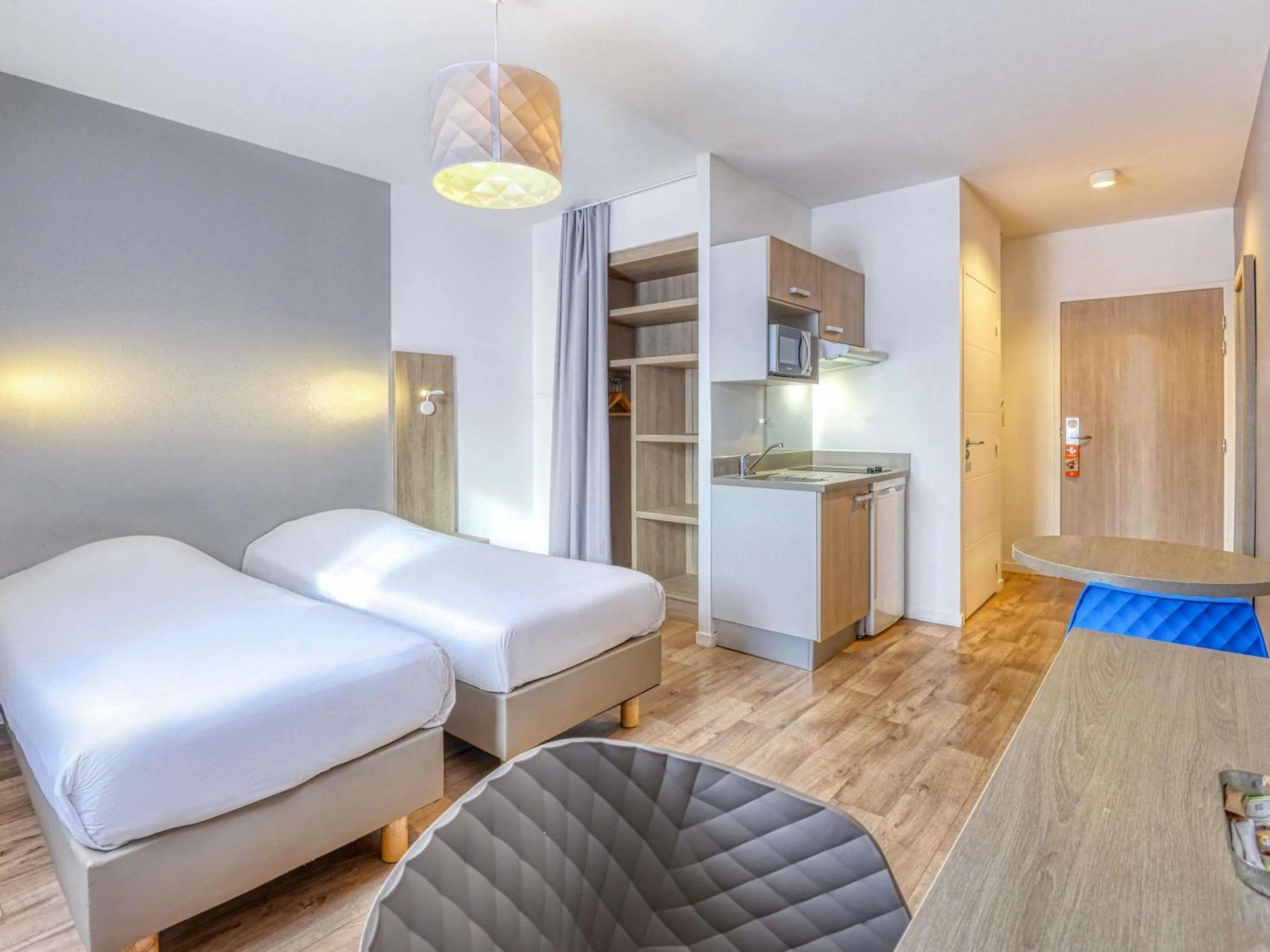 Bedroom, Bed in Aparthotel Adagio Access Saint Nazaire