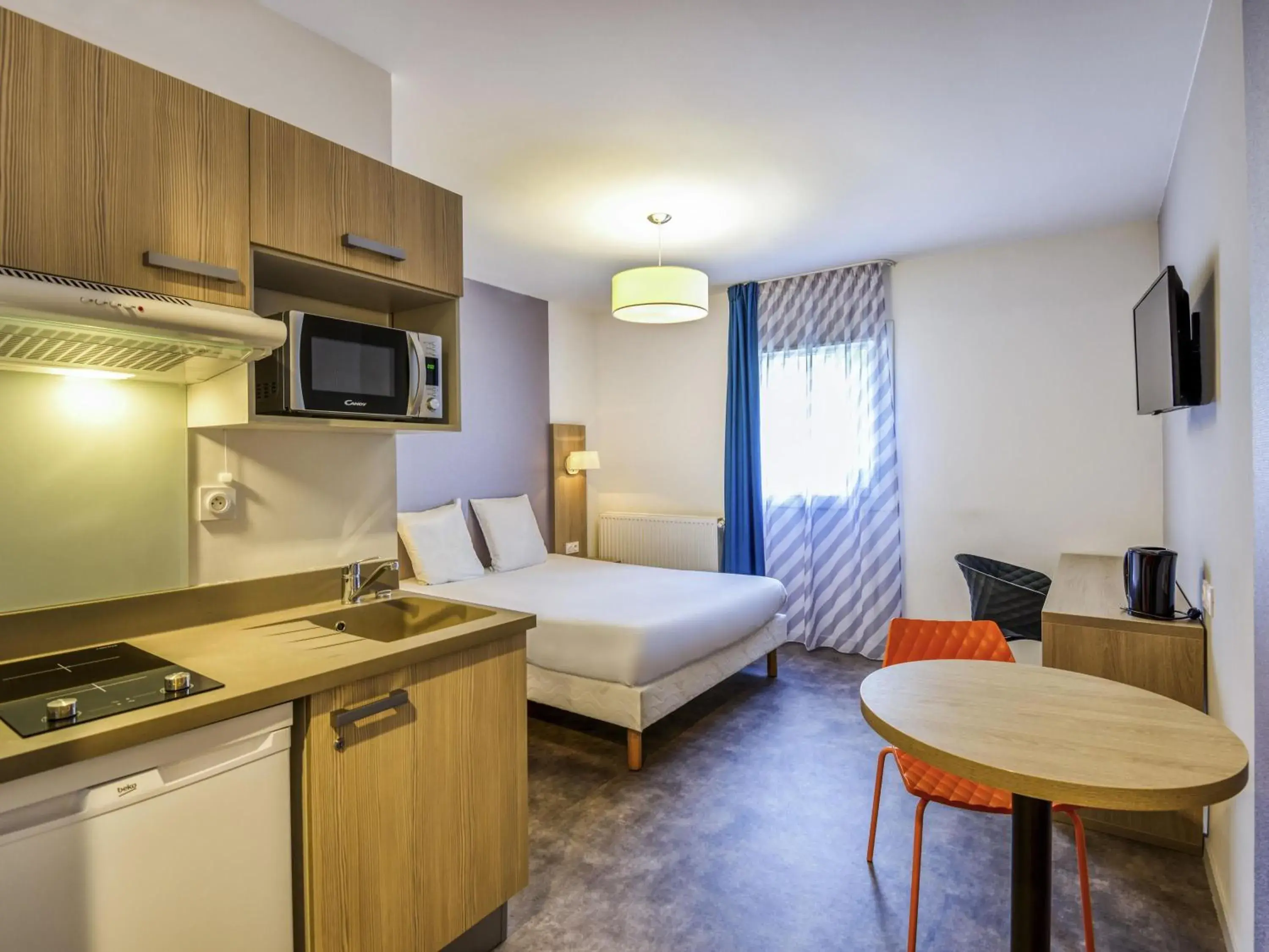 Bedroom, Bed in Aparthotel Adagio Access Saint Nazaire Bedroom, Bed in Aparthotel Adagio Access Saint Nazaire