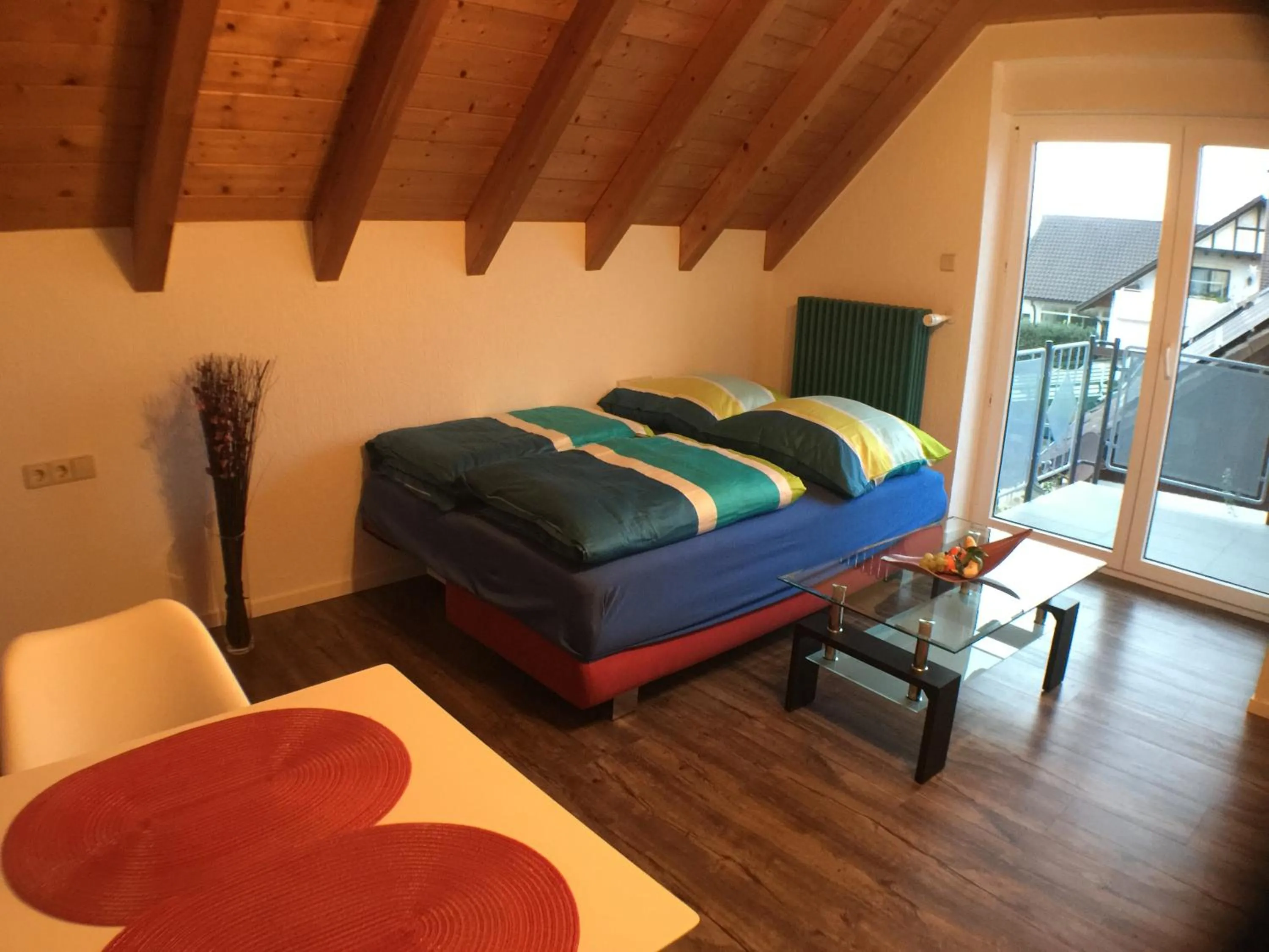 Living room, Bed in Ferienwohnung Alte B3
