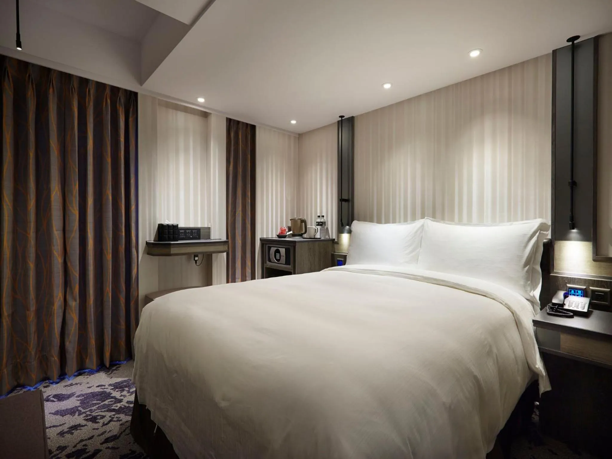 Bed in At Home Hotel Ximen