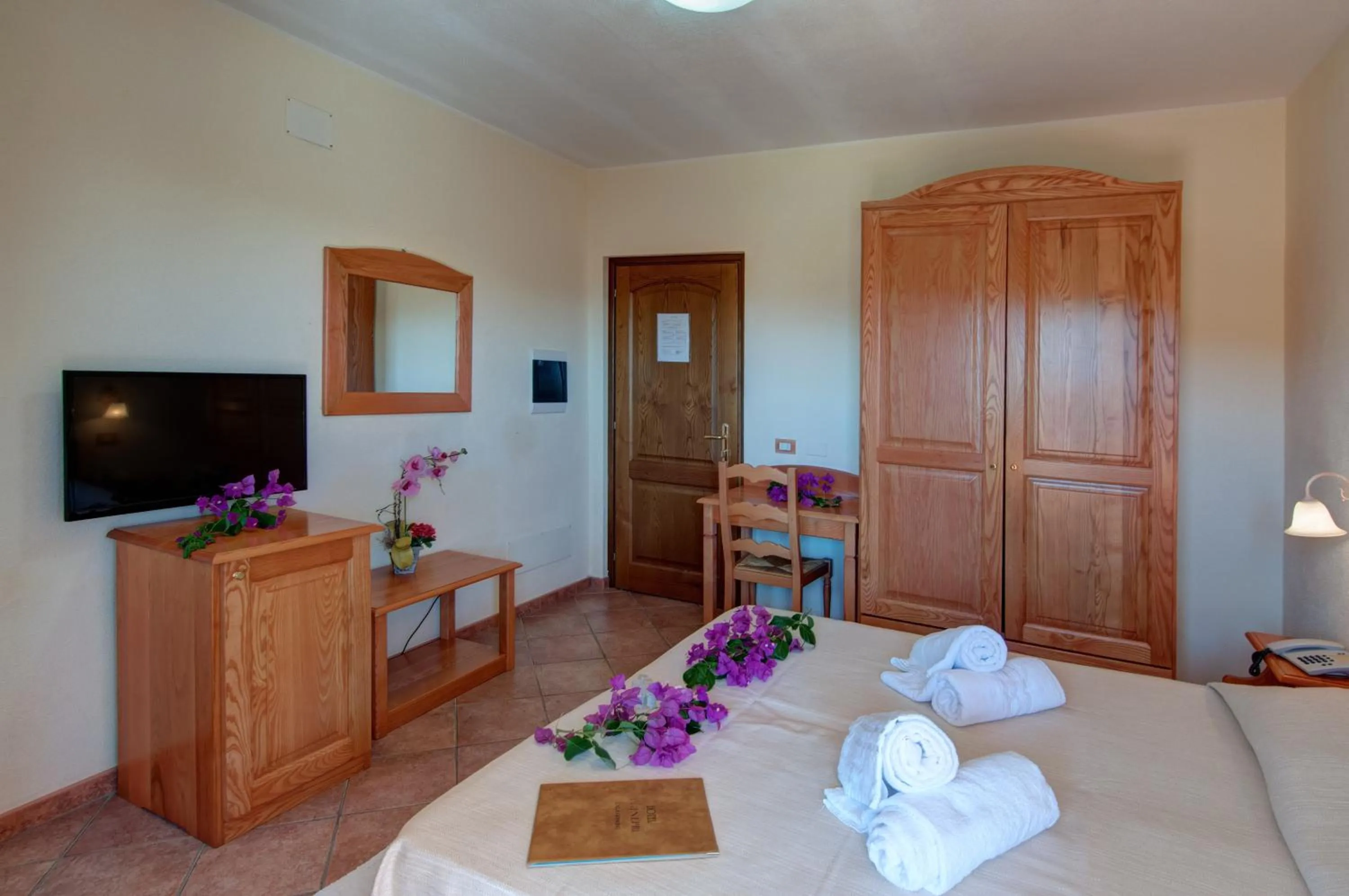 Bed in I Ginepri Hotel