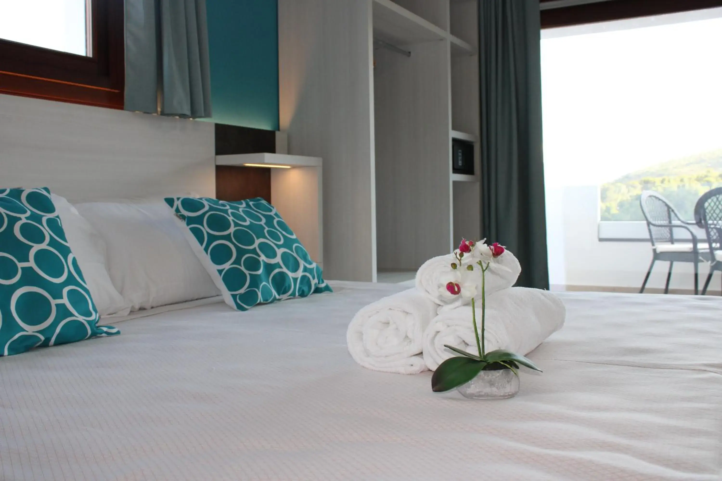 Bed in I Ginepri Hotel Bed in I Ginepri Hotel