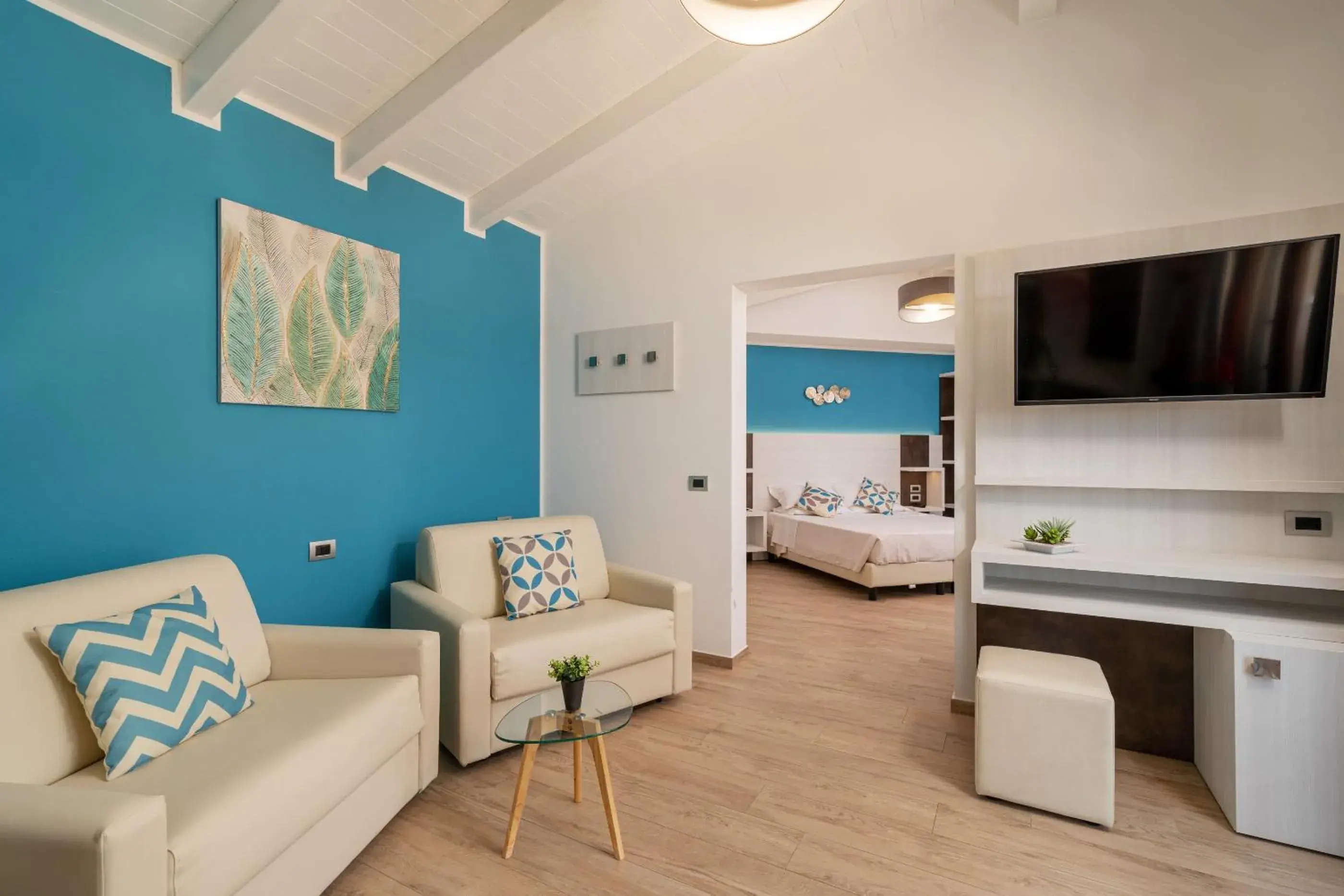 TV and multimedia, Bed in I Ginepri Hotel TV and multimedia, Bed in I Ginepri Hotel