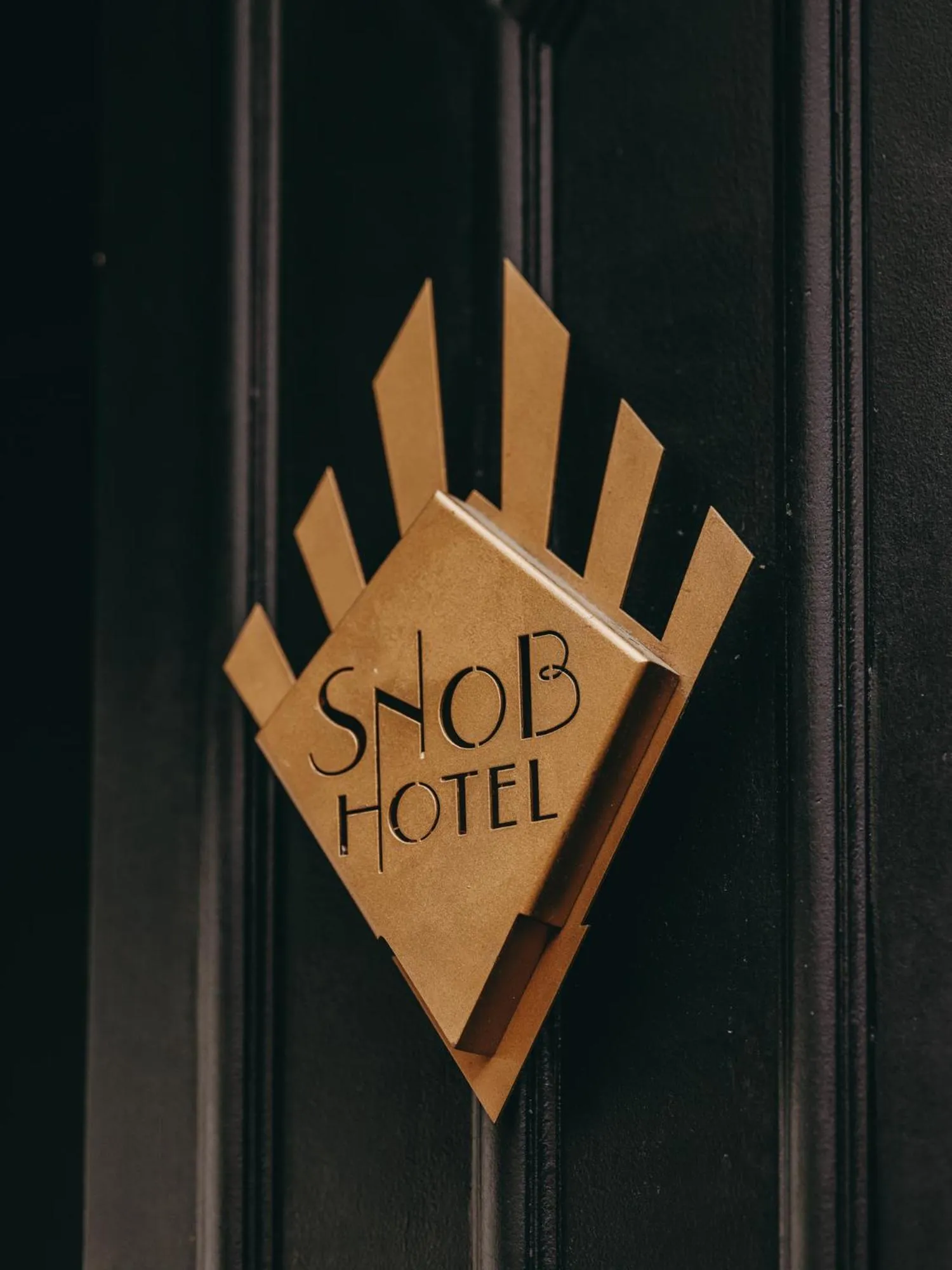Property logo or sign in Snob Hotel