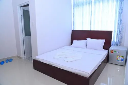 Bed in Xuan Anh Guesthouse, nhà nghỉ gia đình