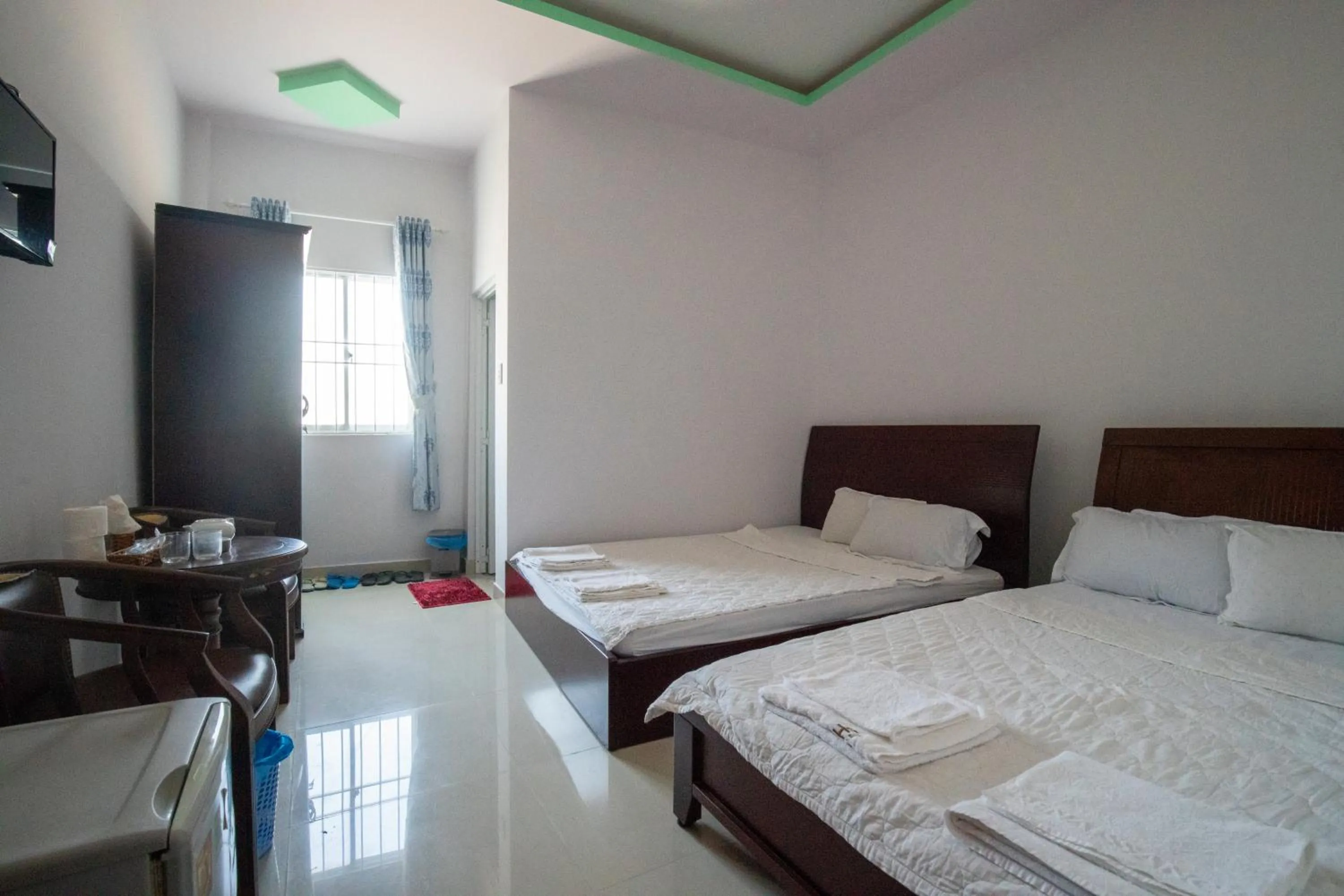 Bed in Xuan Anh Guesthouse, nhà nghỉ gia đình
